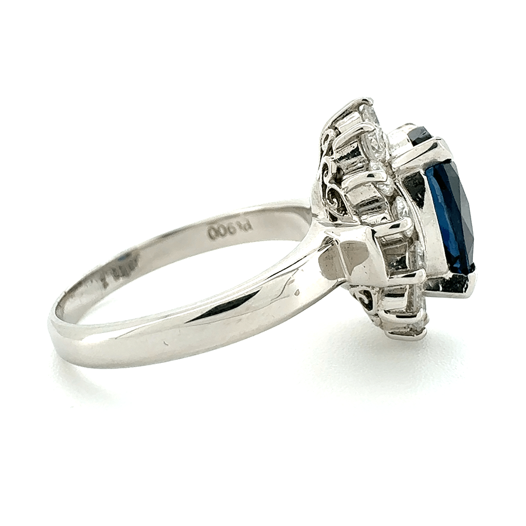 Platinum Sapphire And Diamond Cluster Ring