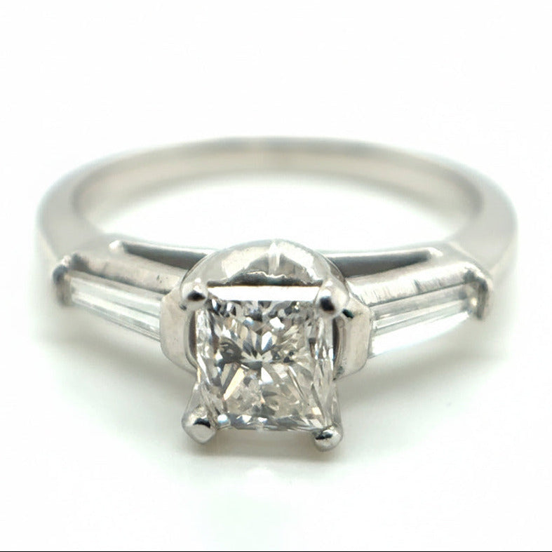 Platinum Diamond Solitaire with Baguette-cut Diamond shoulders