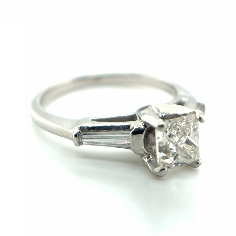 Platinum Diamond Solitaire with Baguette-cut Diamond shoulders