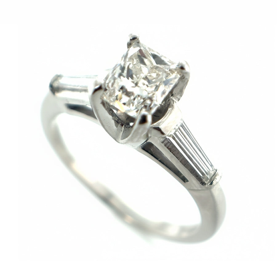 Platinum Diamond Solitaire with Baguette-cut Diamond shoulders
