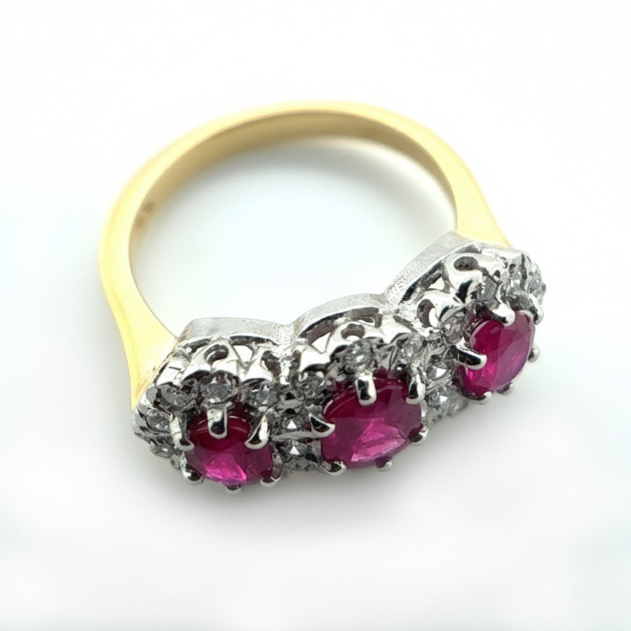 18ct Yellow Gold 3 Stone Ruby with Diamond Halo Ring