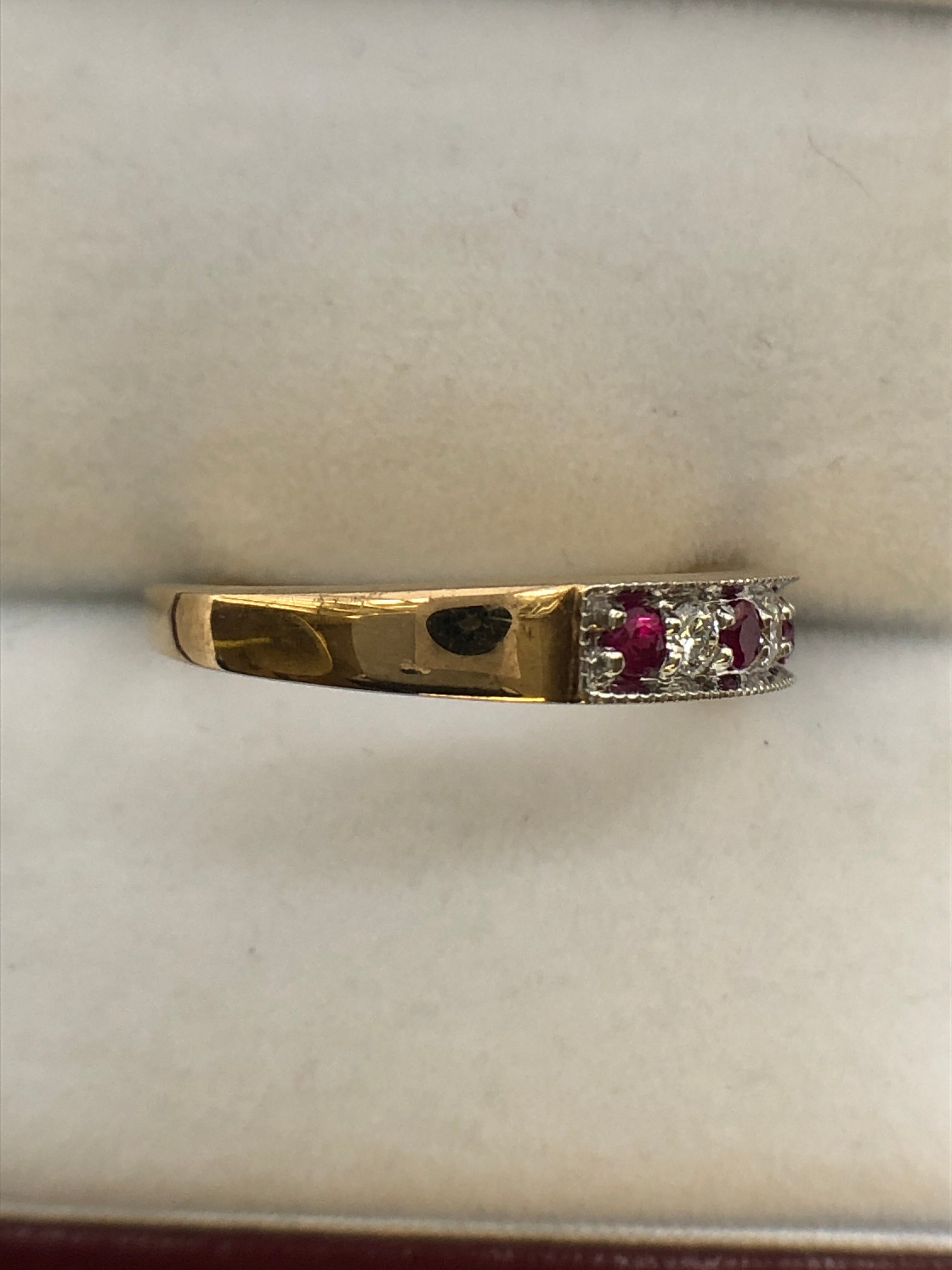 A 9ct gold ruby and diamond ring