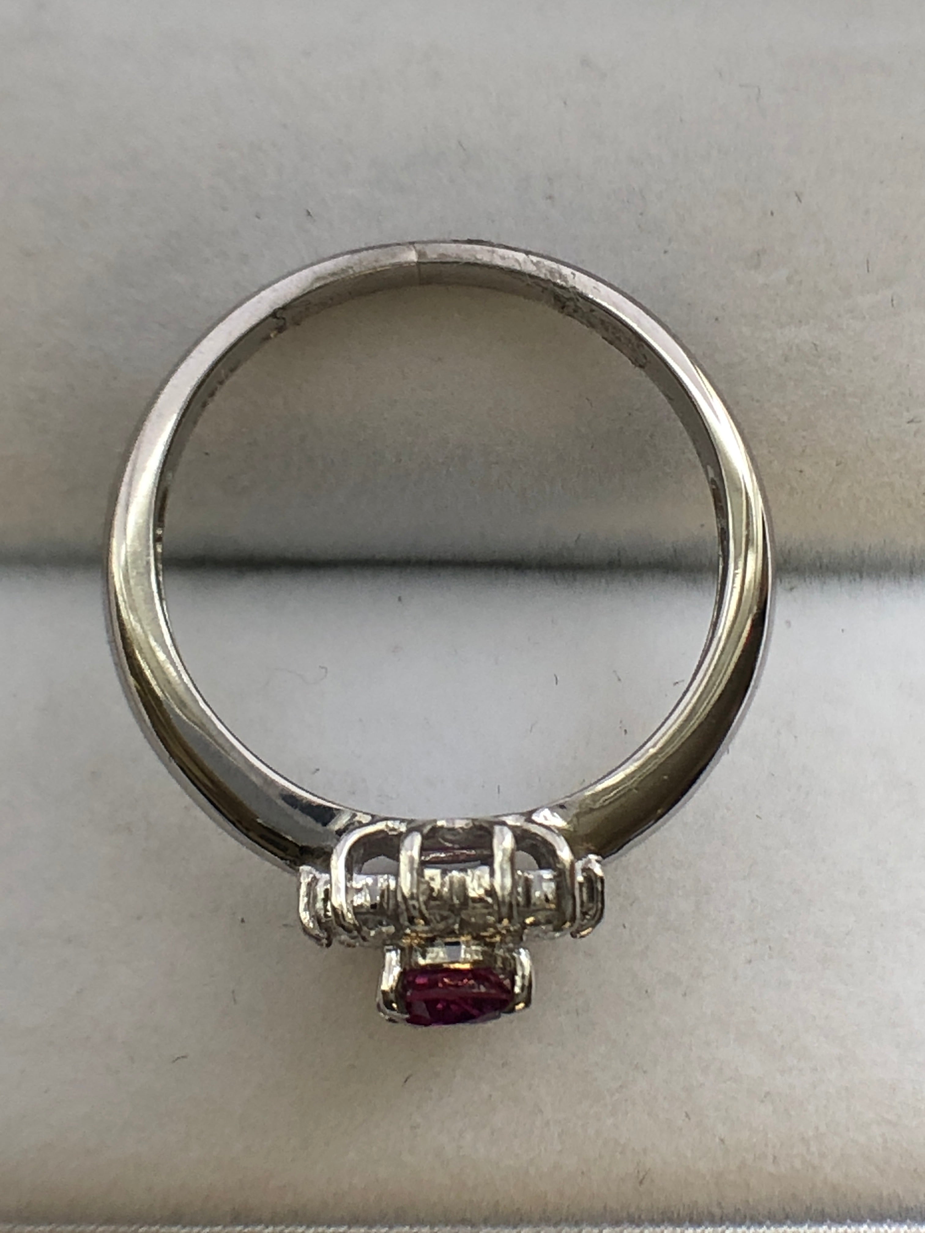 A platinum ruby and diamond cluster ring
