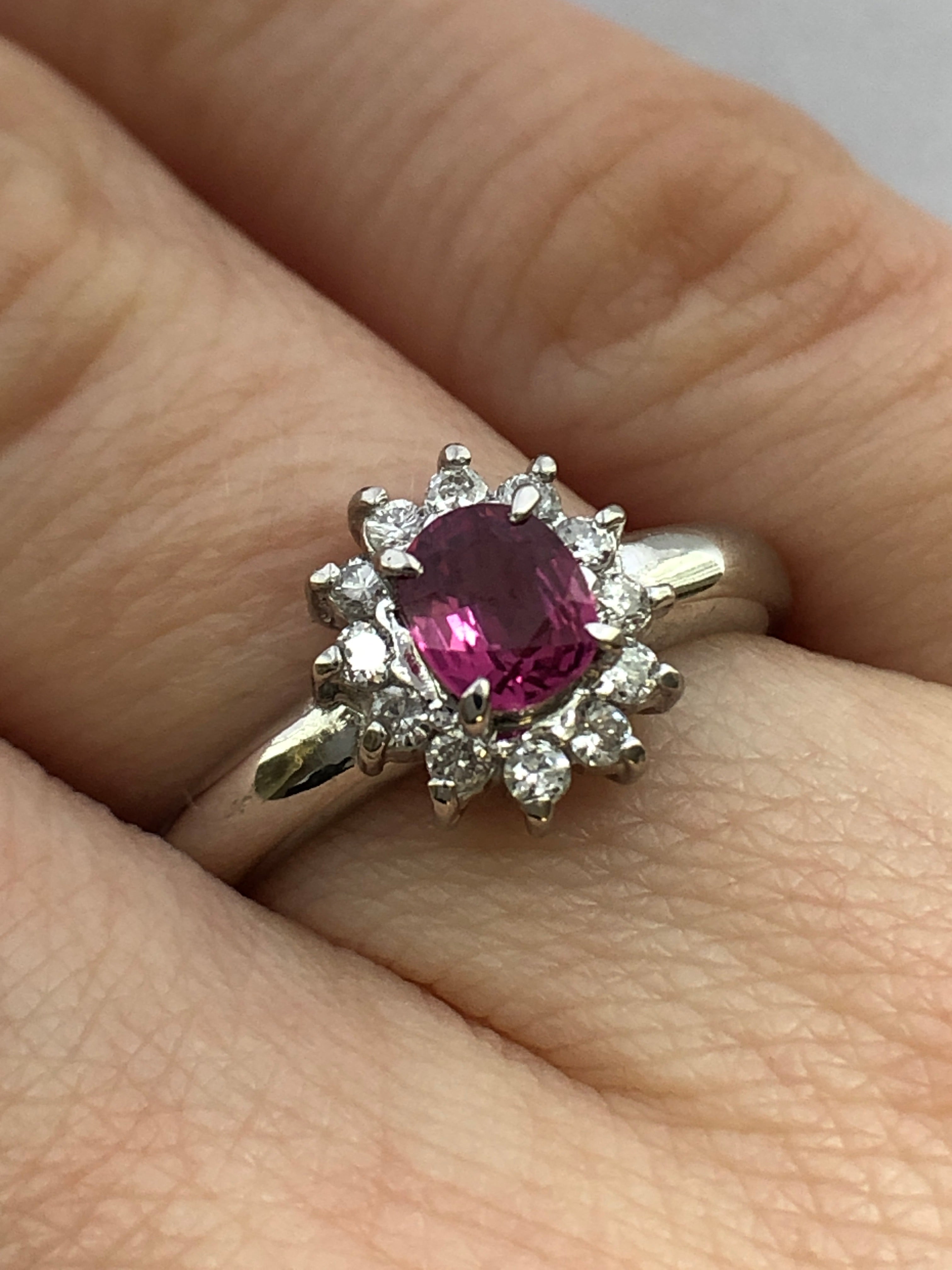 A platinum ruby and diamond cluster ring