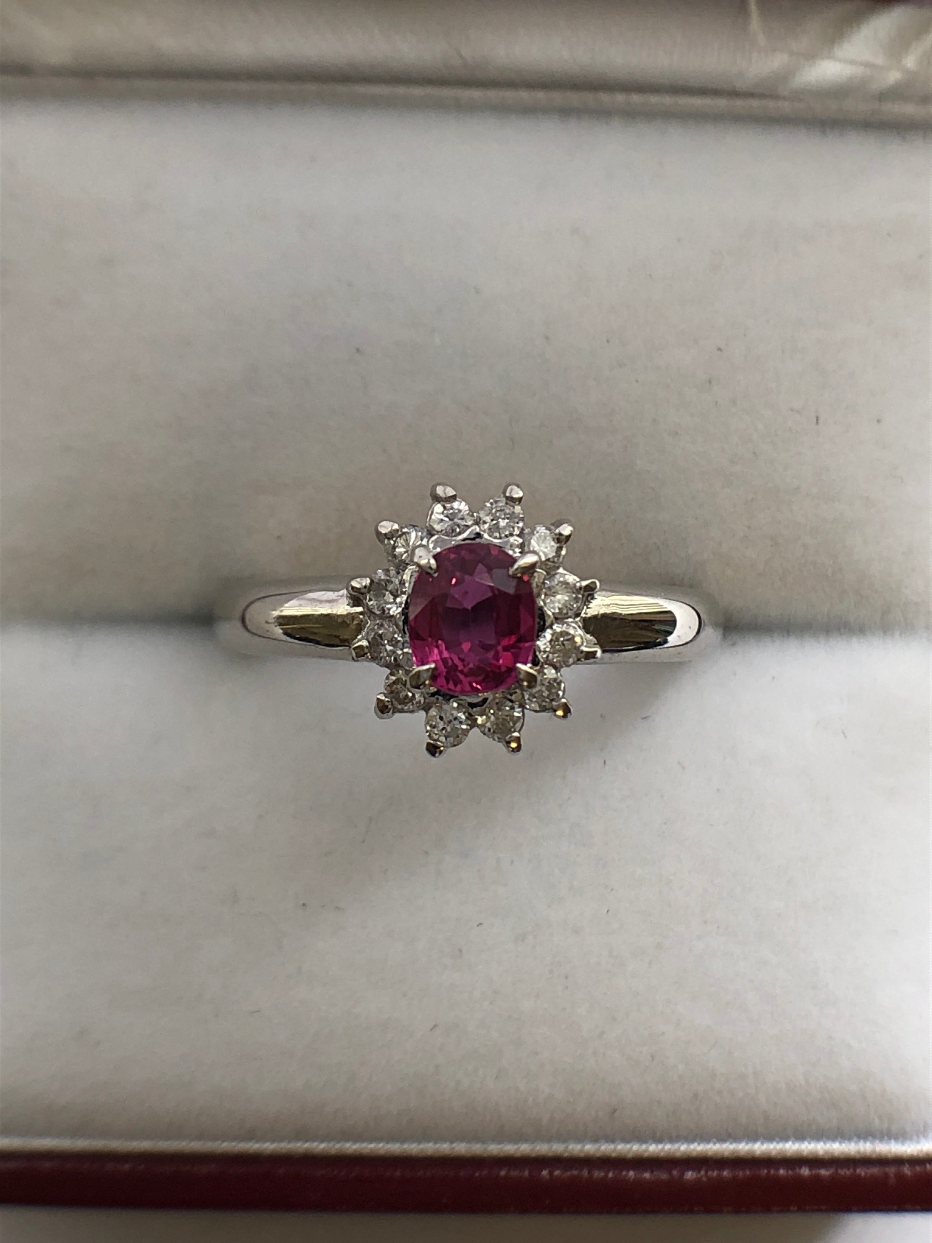 A platinum ruby and diamond cluster ring