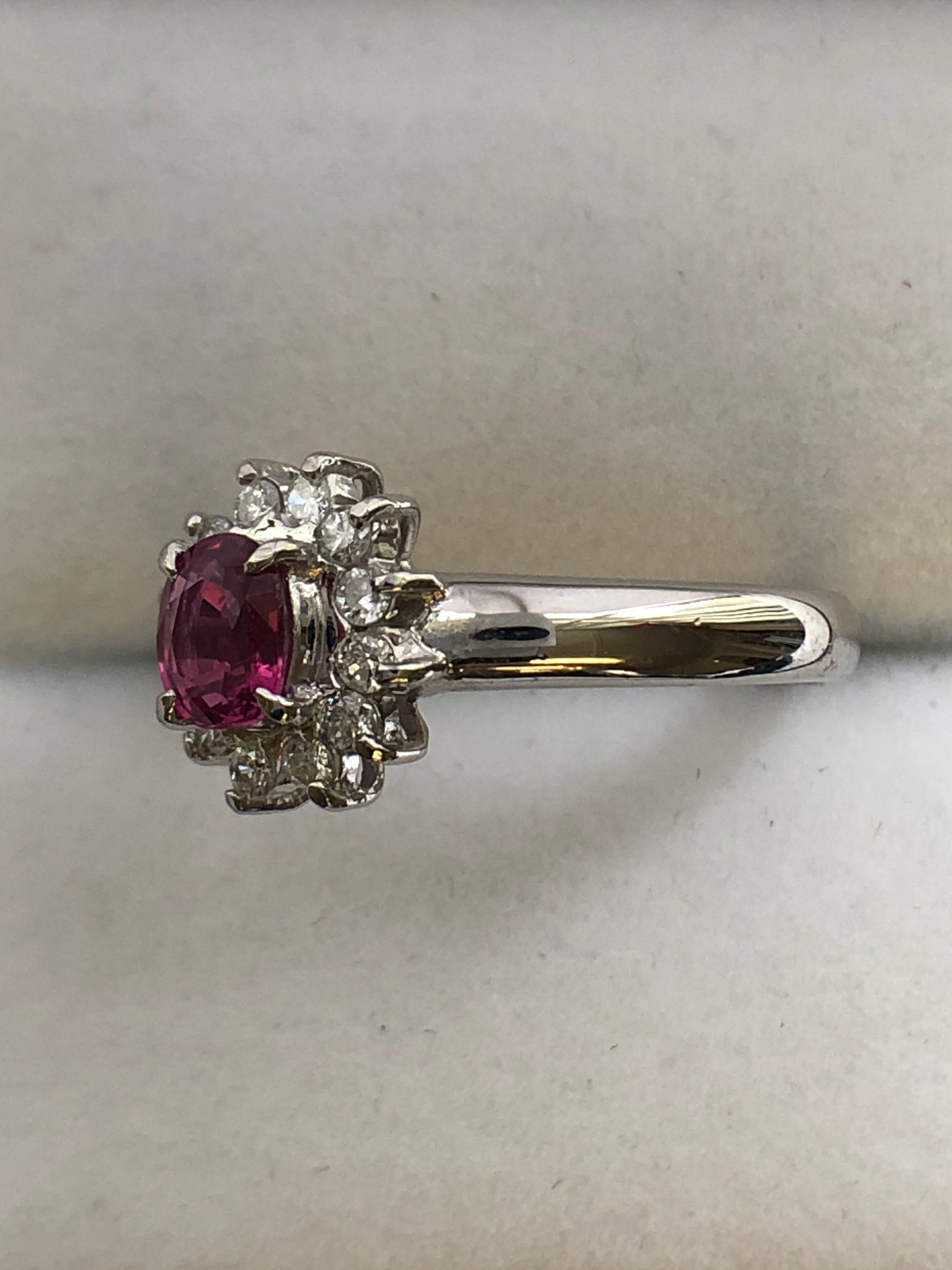 A platinum ruby and diamond cluster ring