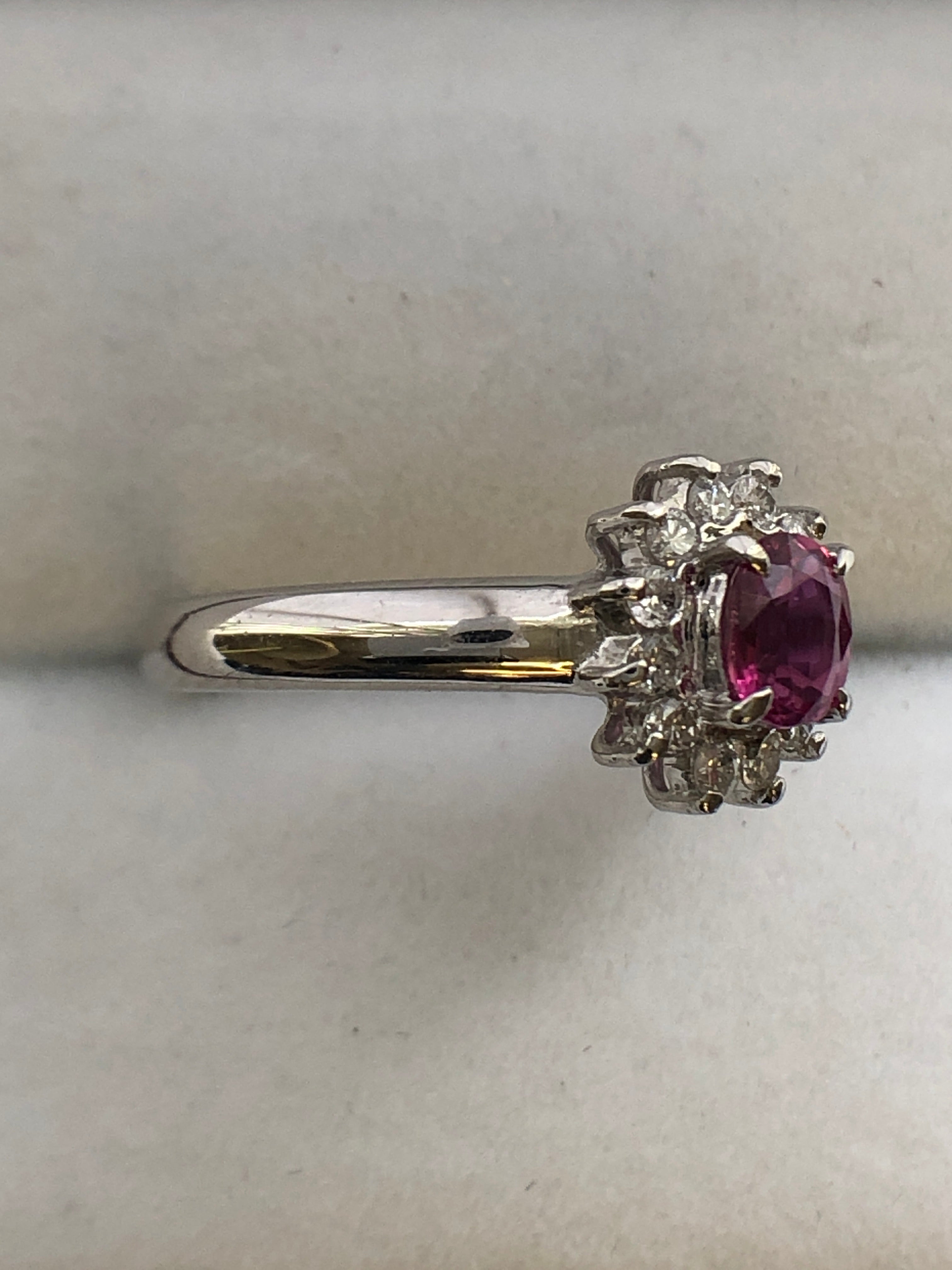 A platinum ruby and diamond cluster ring