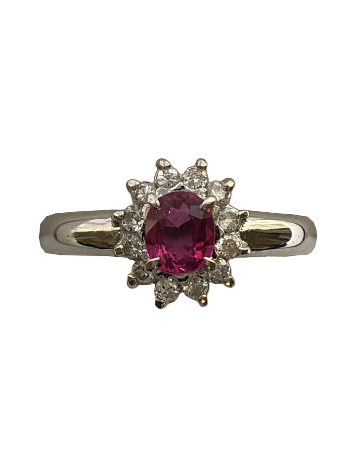A platinum ruby and diamond cluster ring