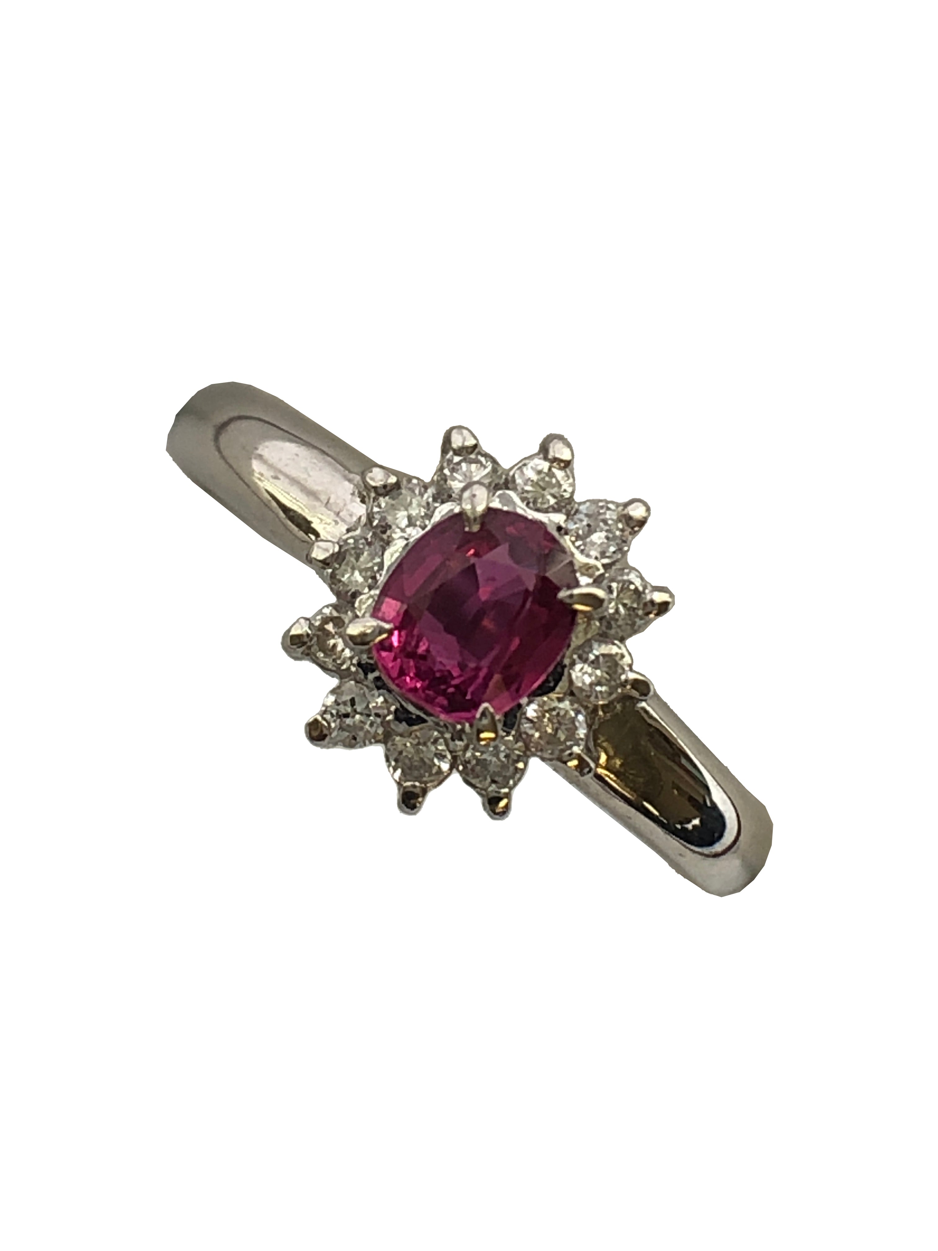 A platinum ruby and diamond cluster ring