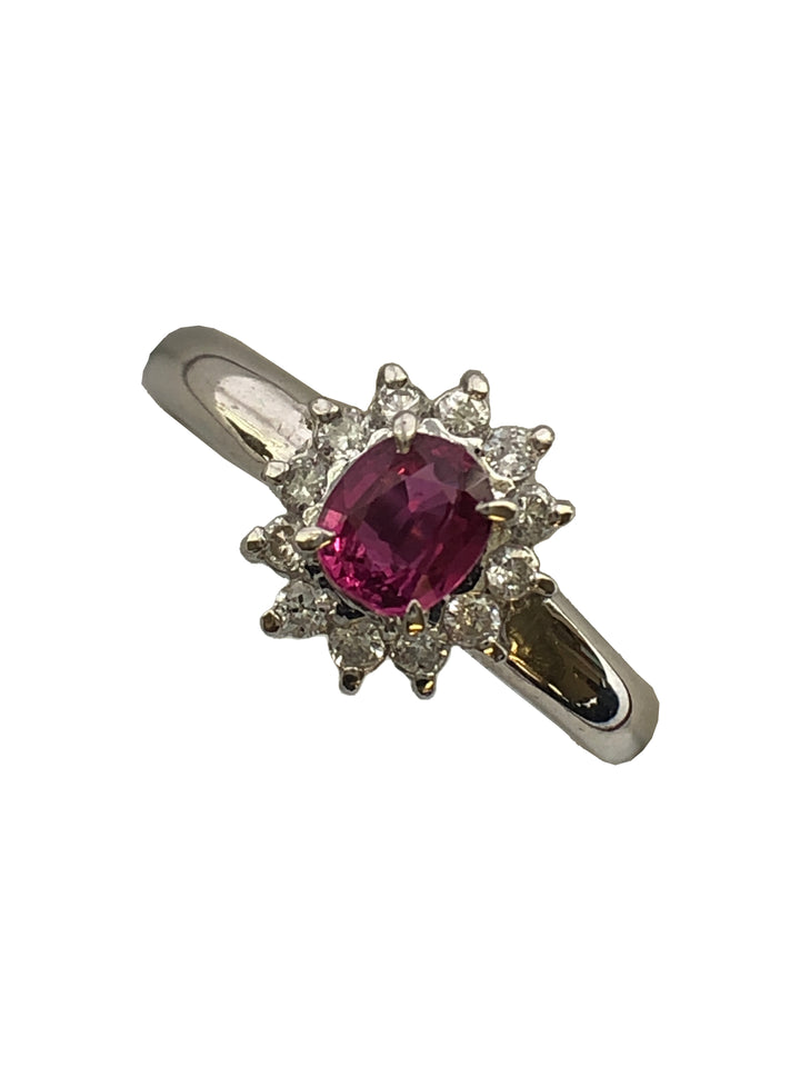 A platinum ruby and diamond cluster ring