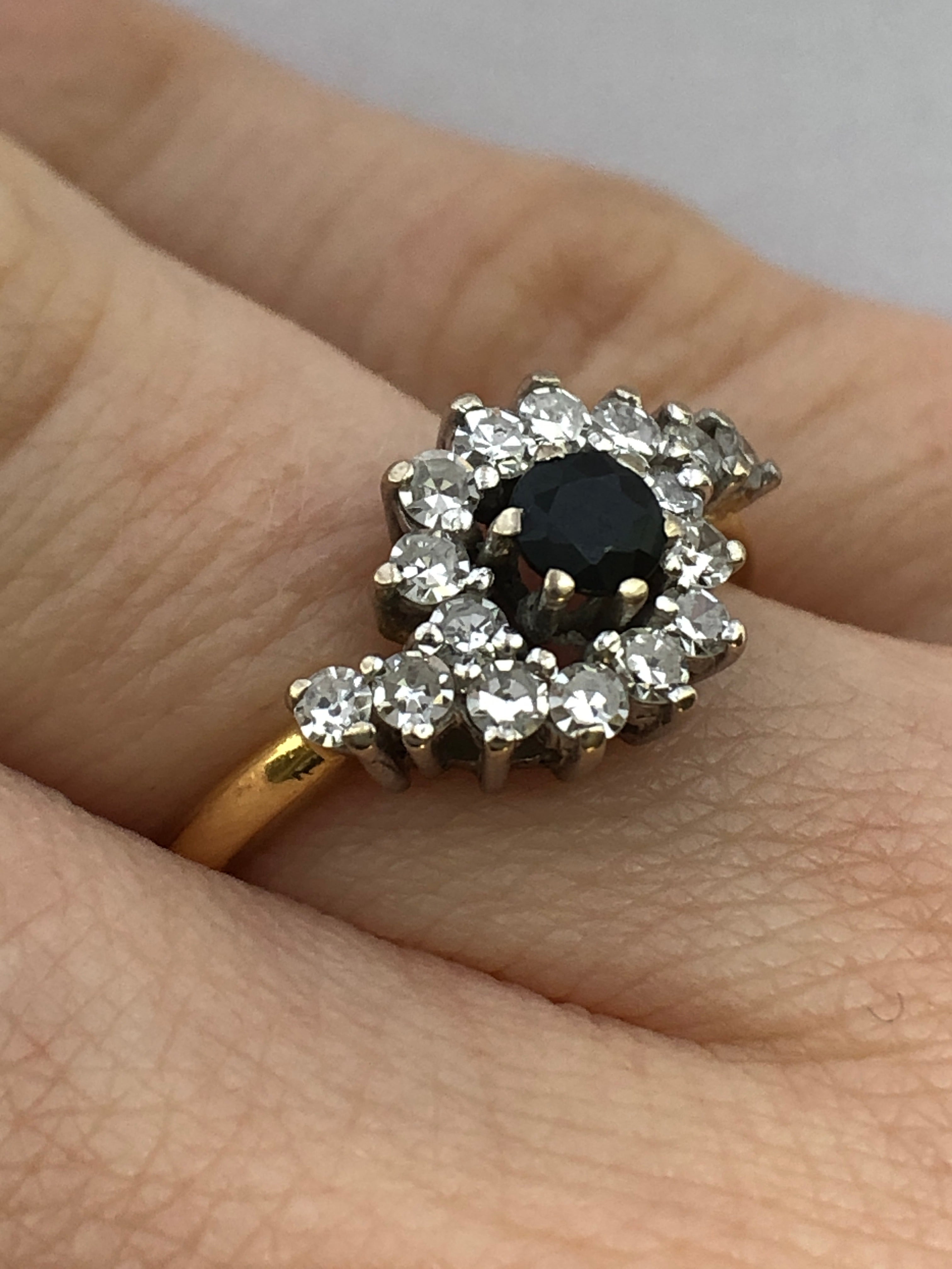 An 18ct gold sapphire and diamond ring