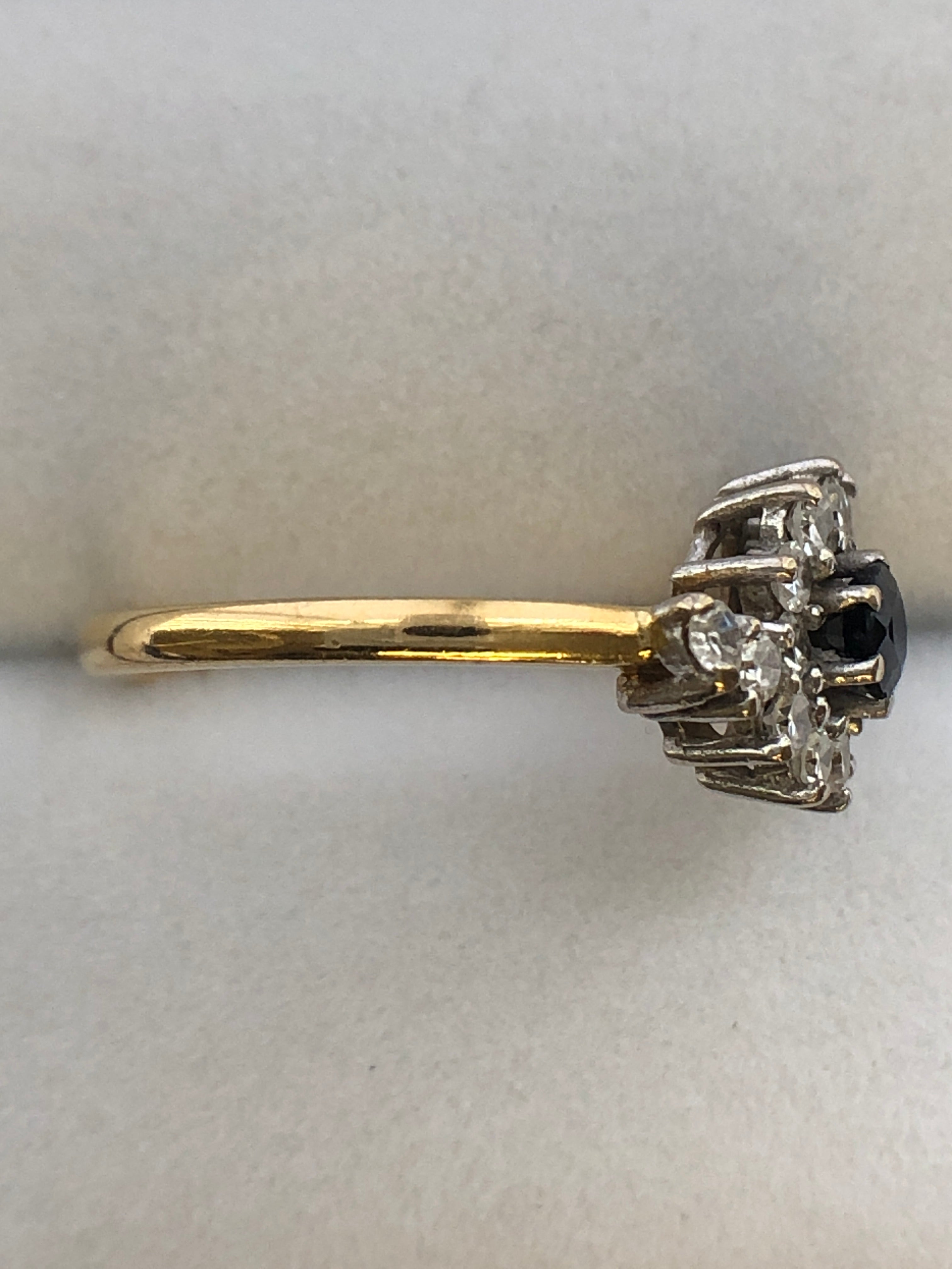 An 18ct gold sapphire and diamond ring