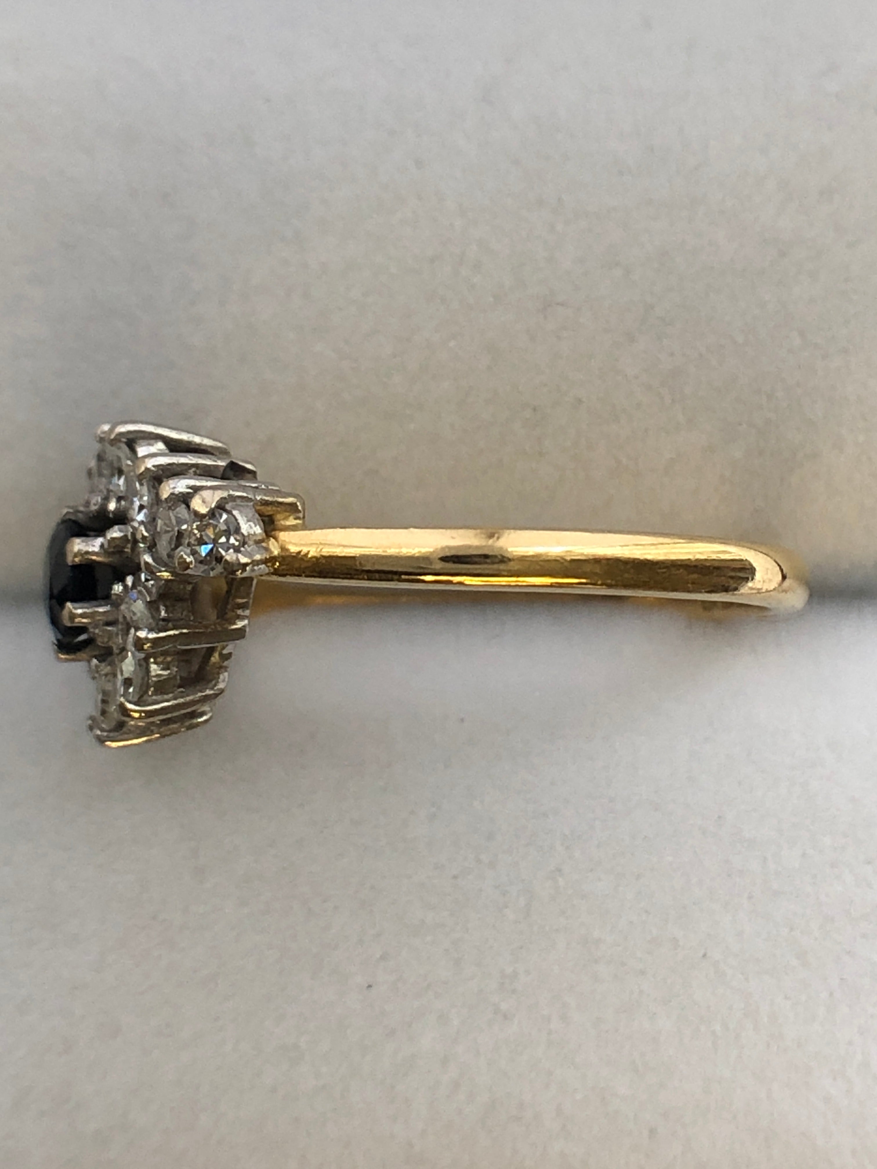 An 18ct gold sapphire and diamond ring