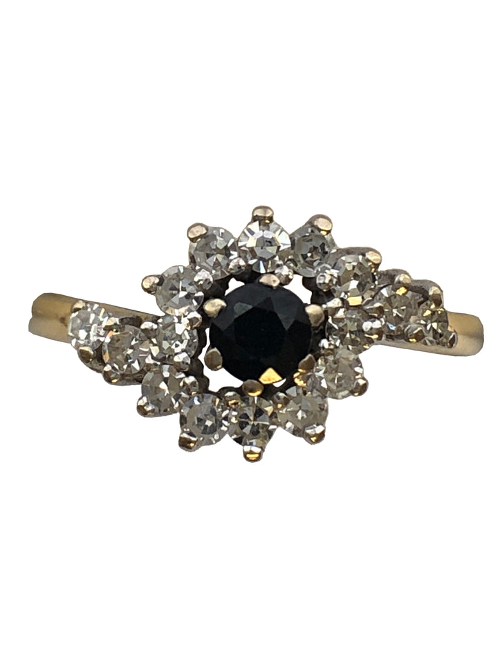 An 18ct gold sapphire and diamond ring