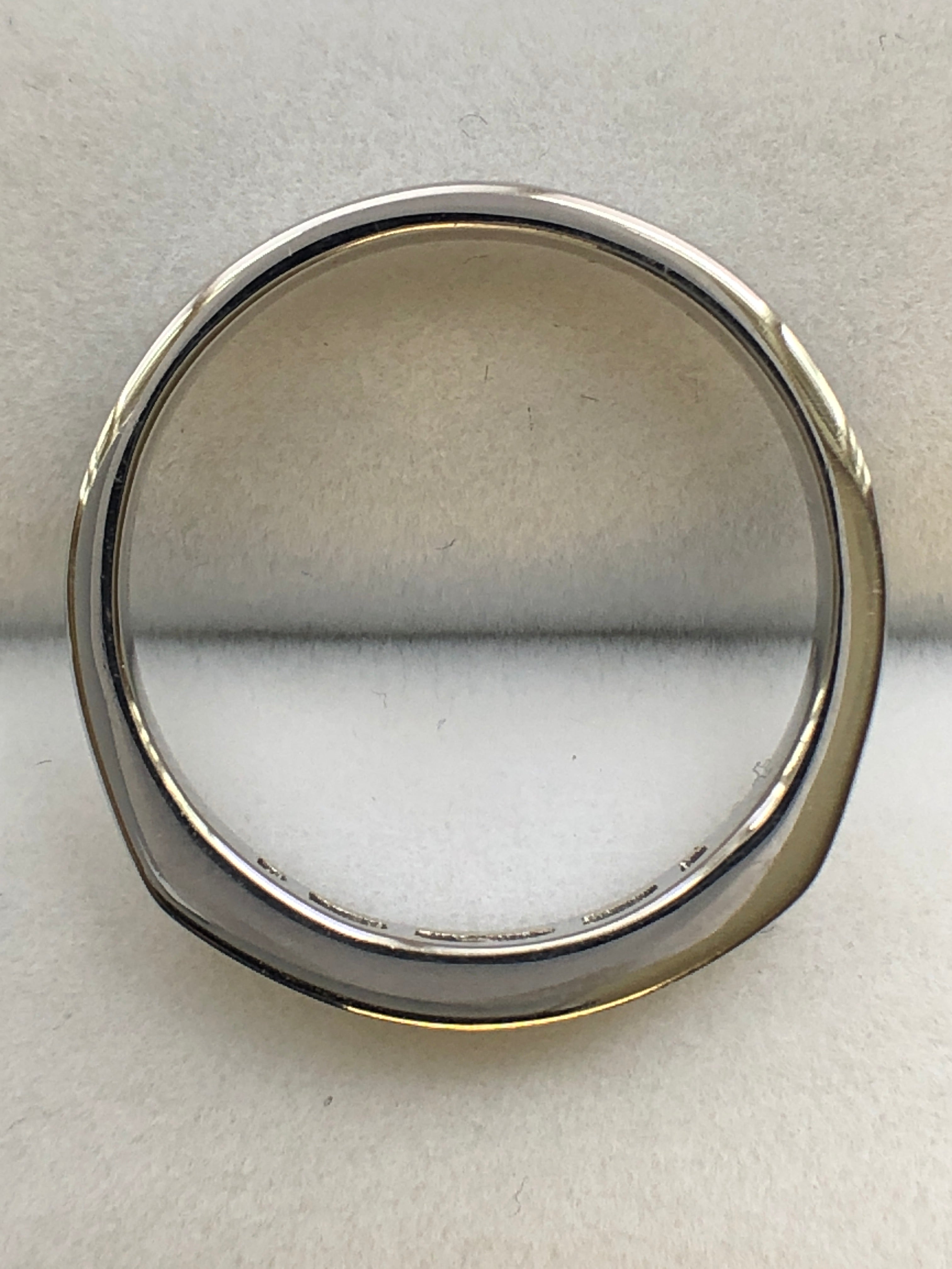 A 9ct white gold sapphire and diamond half eternity ring