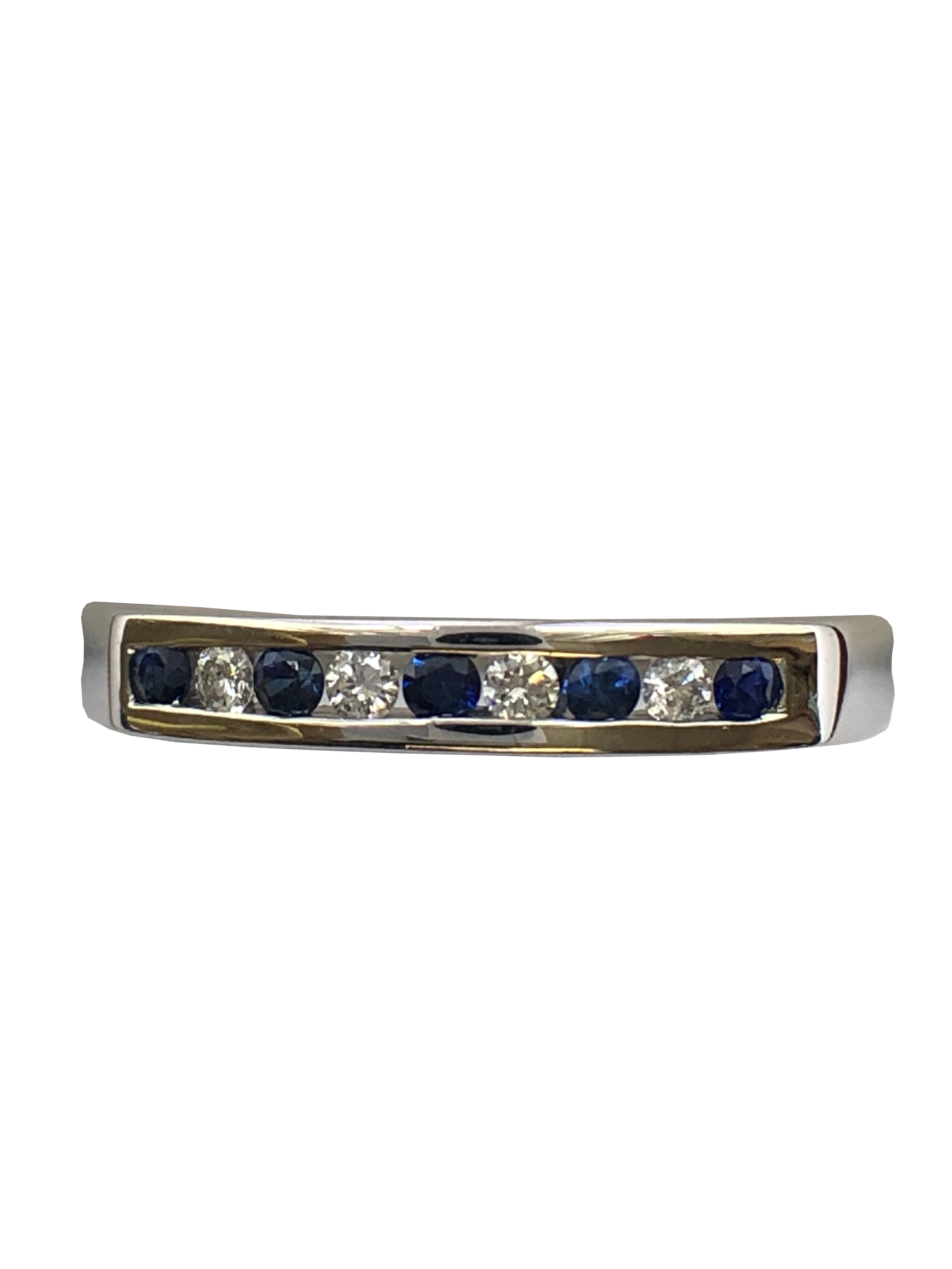 A 9ct white gold sapphire and diamond half eternity ring