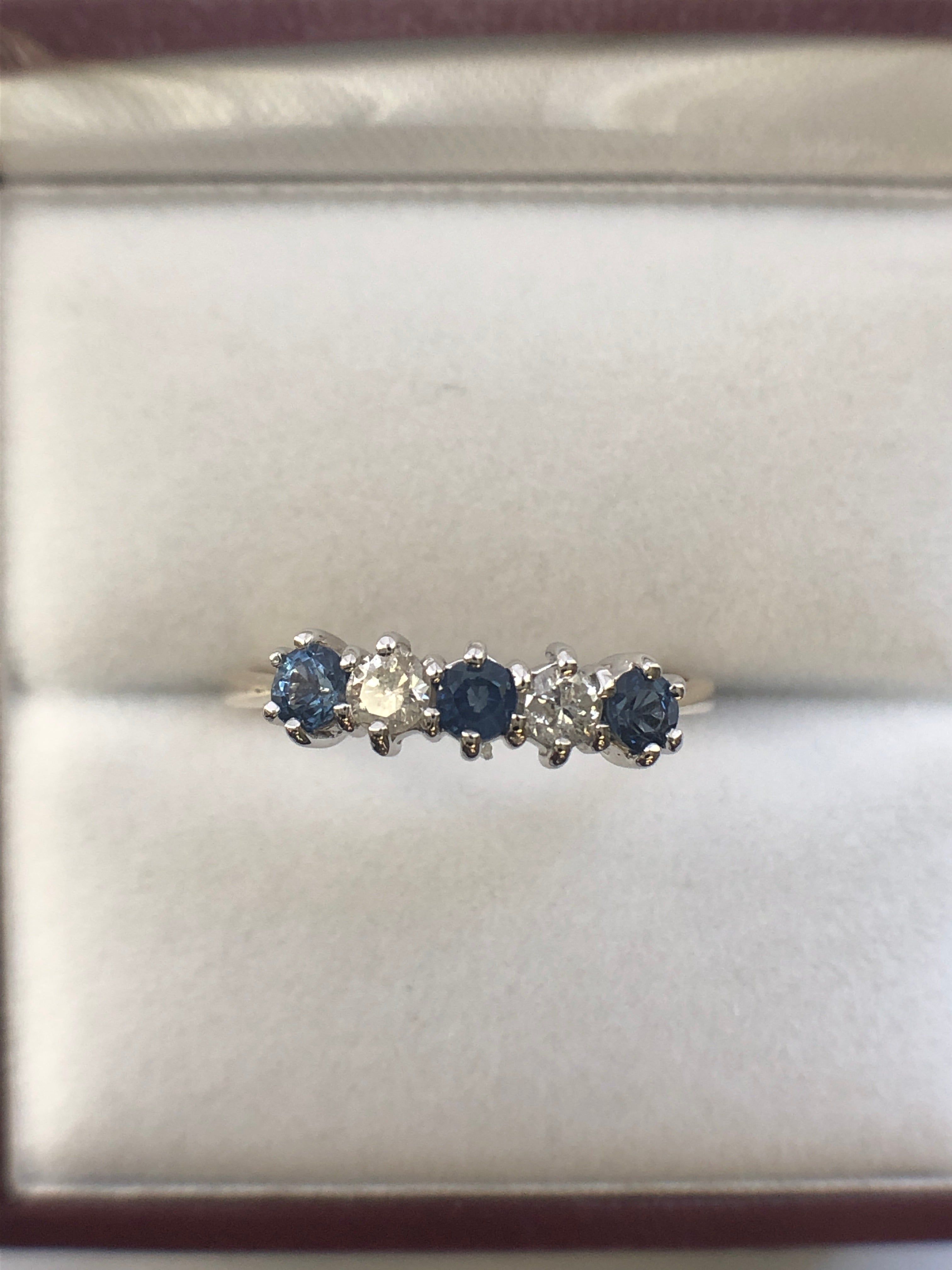 A 9ct gold sapphire and diamond five stone ring