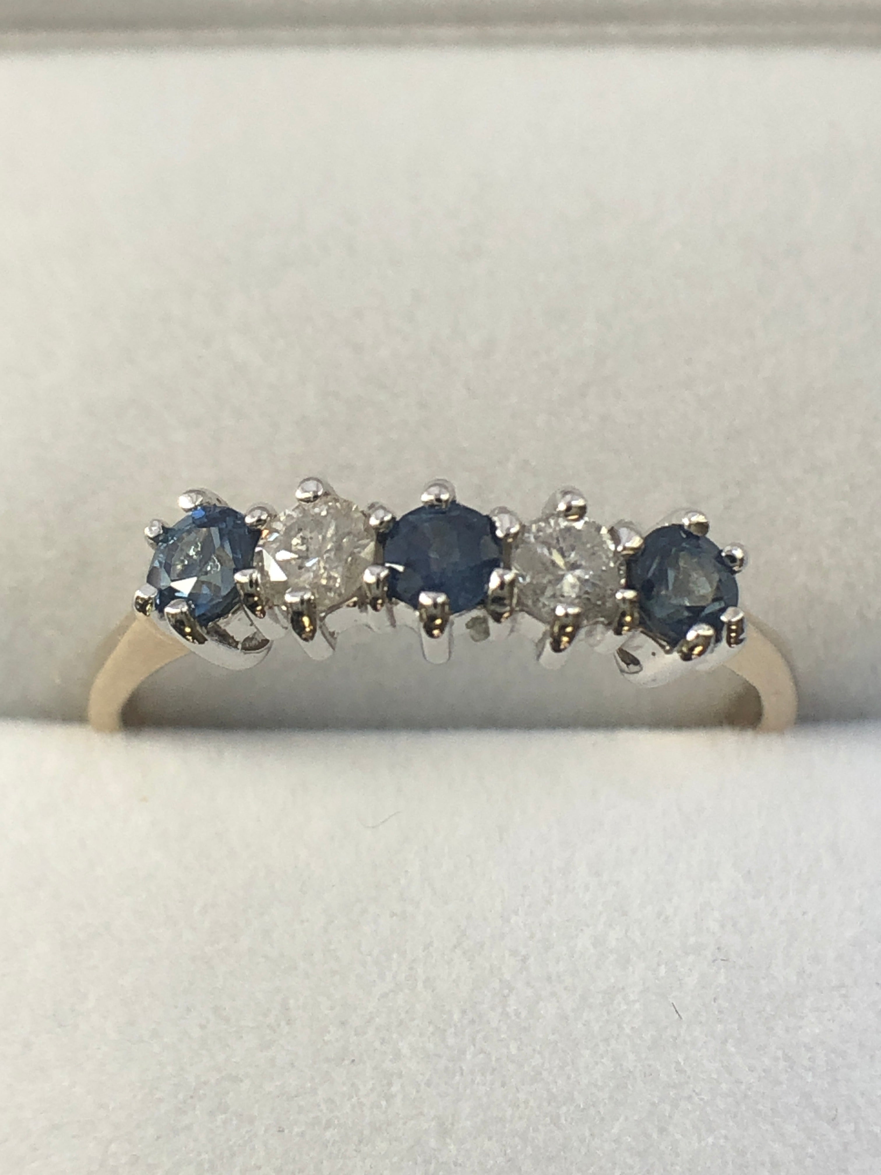 A 9ct gold sapphire and diamond five stone ring