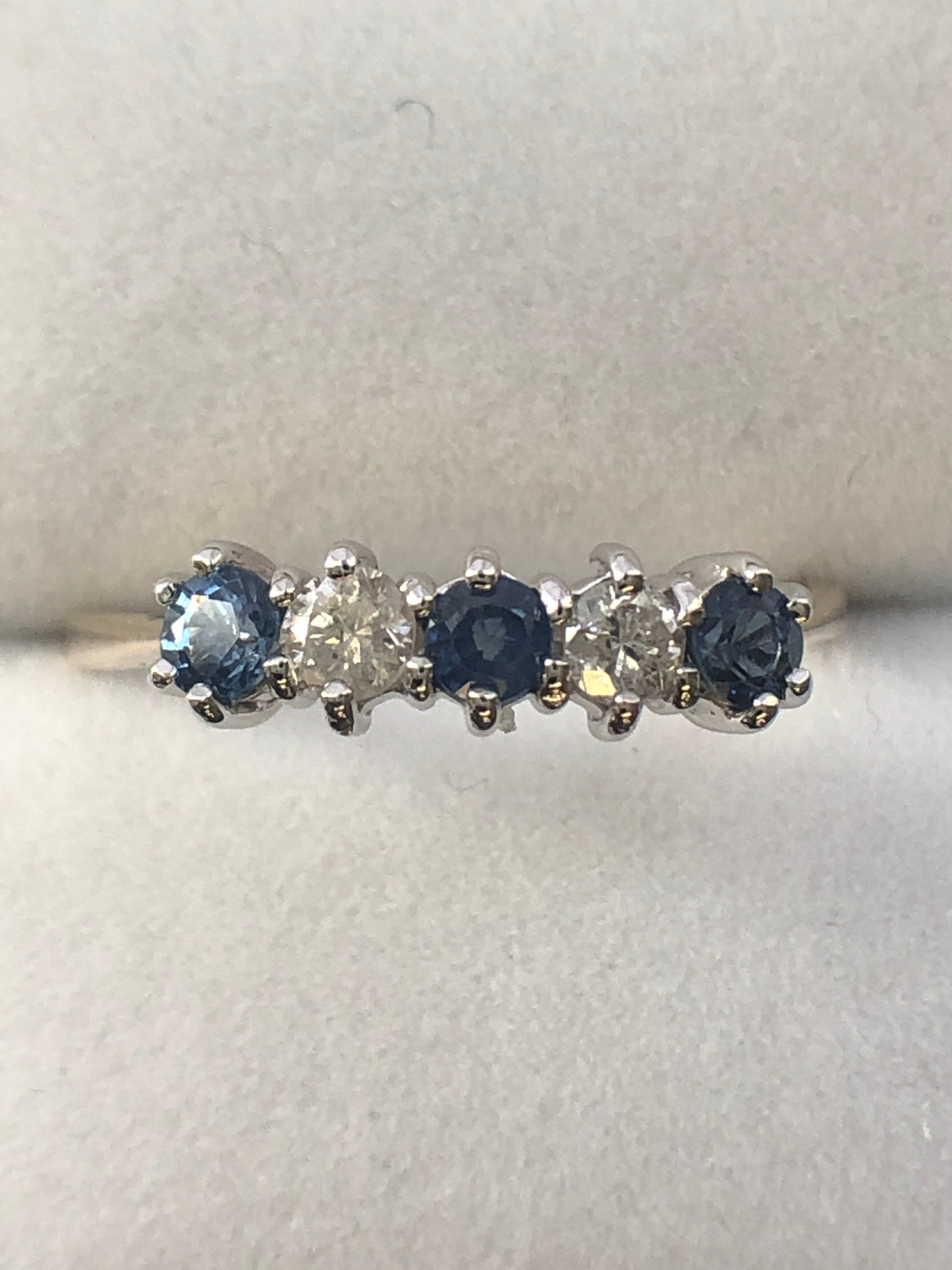 A 9ct gold sapphire and diamond five stone ring