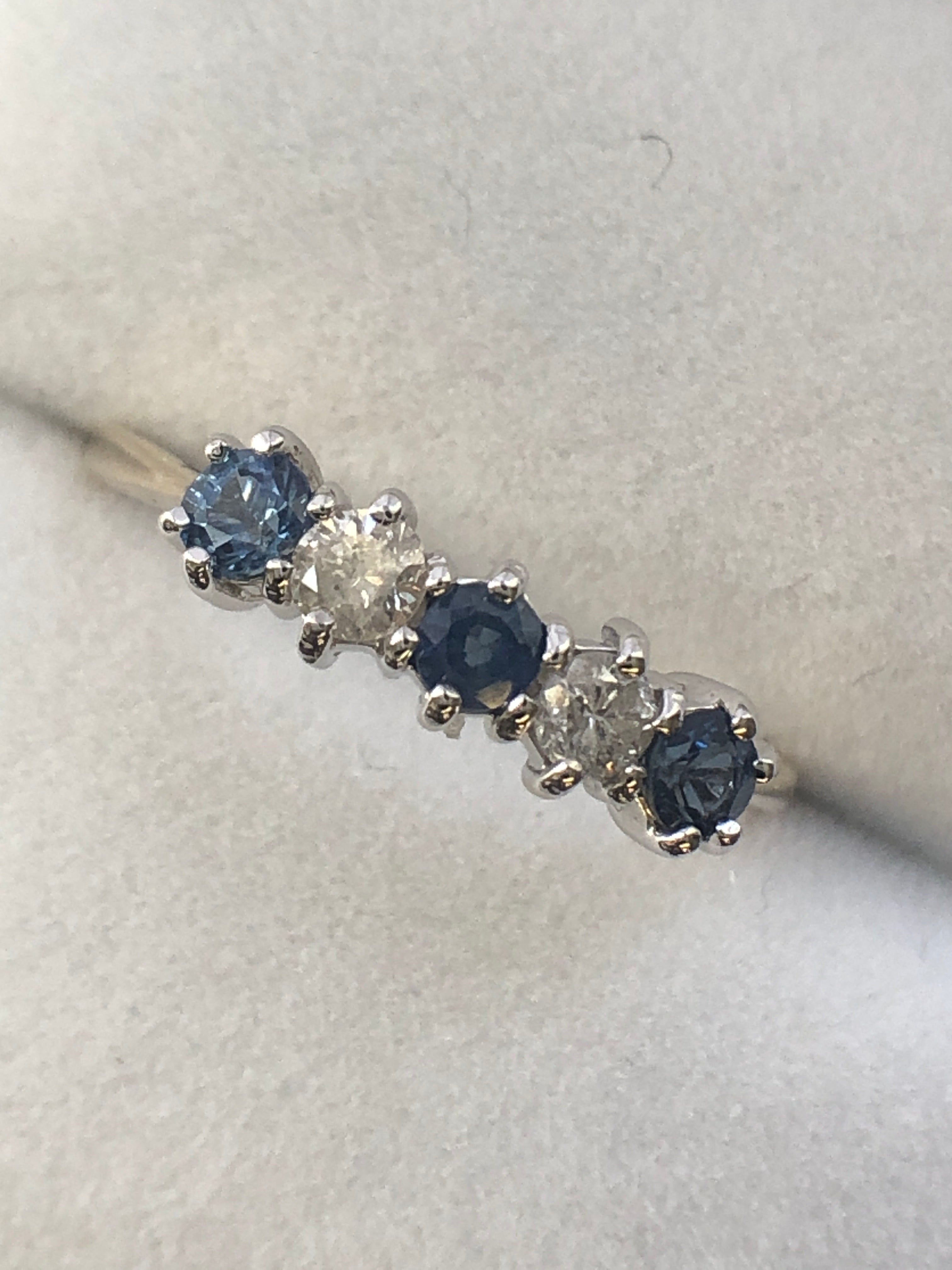 A 9ct gold sapphire and diamond five stone ring