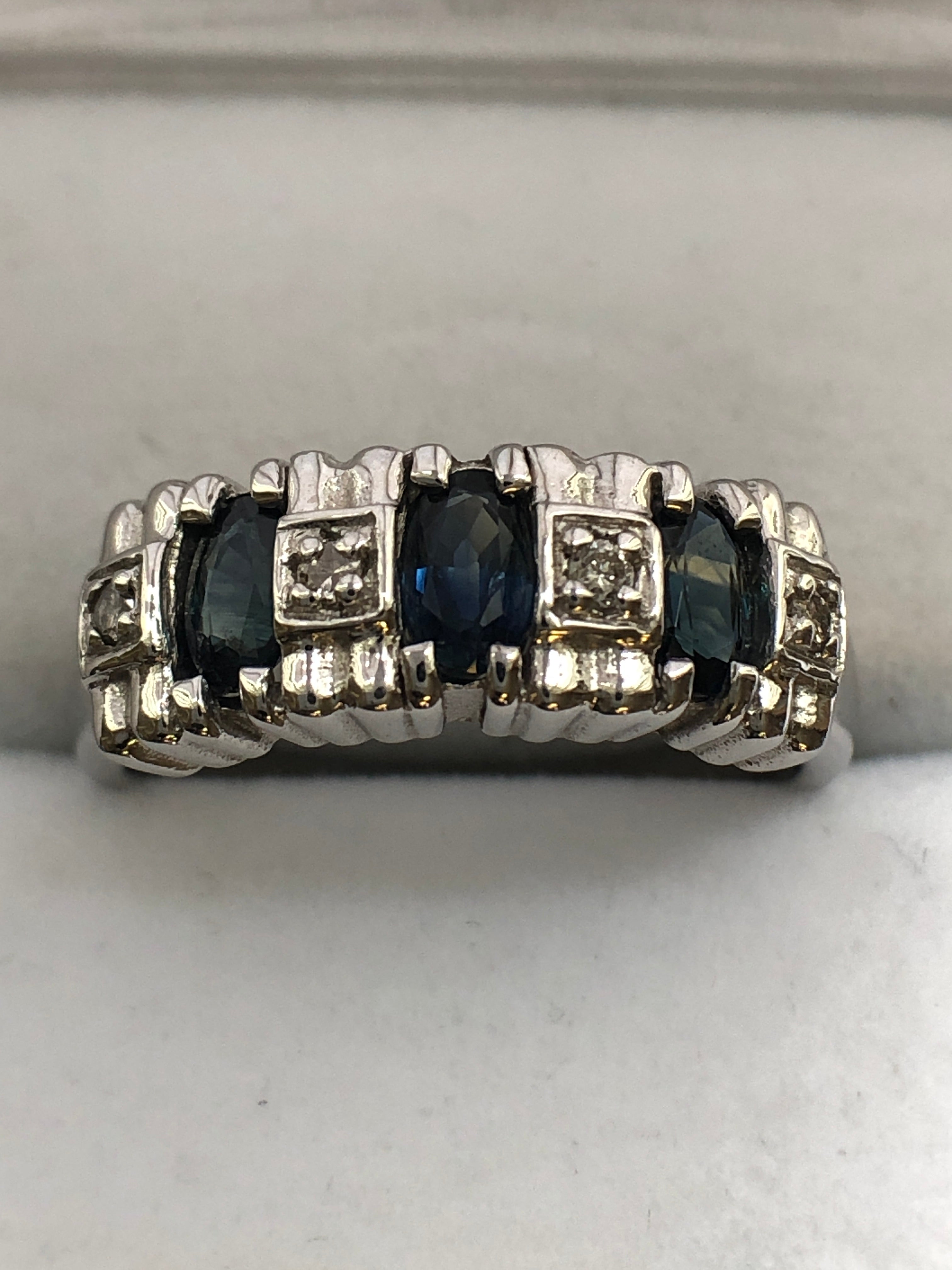 A 14ct white gold sapphire and diamond ring