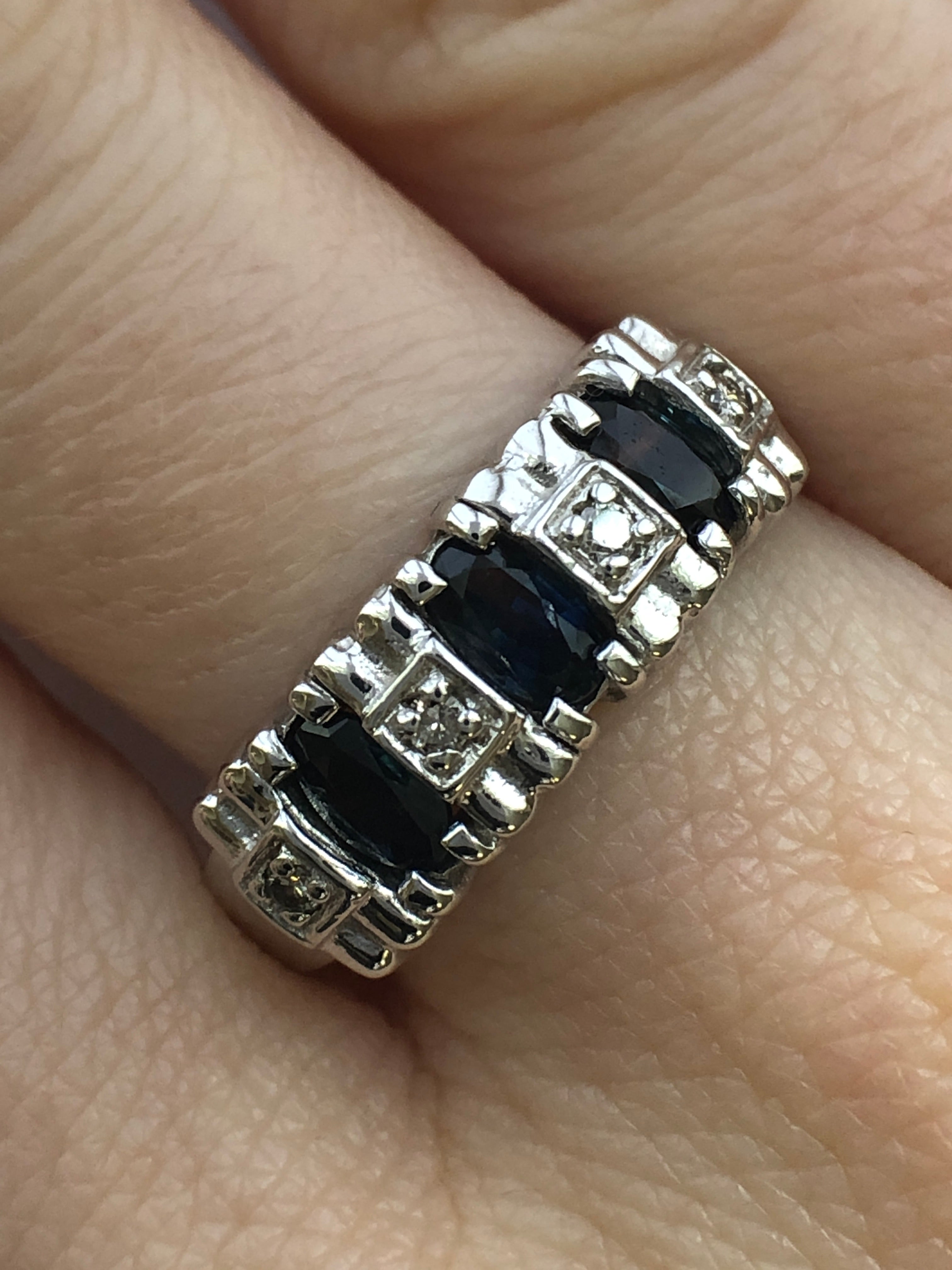 A 14ct white gold sapphire and diamond ring
