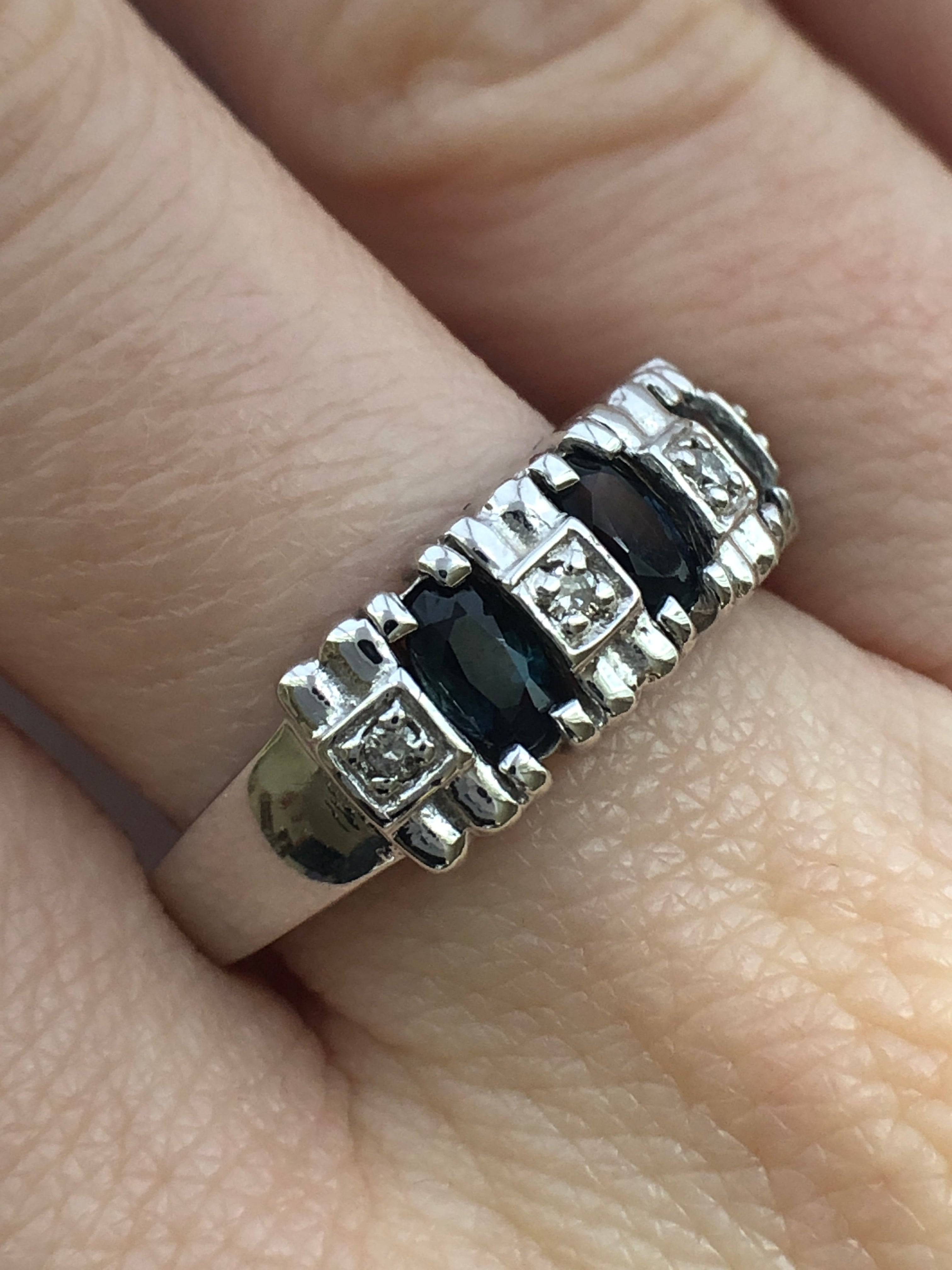 A 14ct white gold sapphire and diamond ring