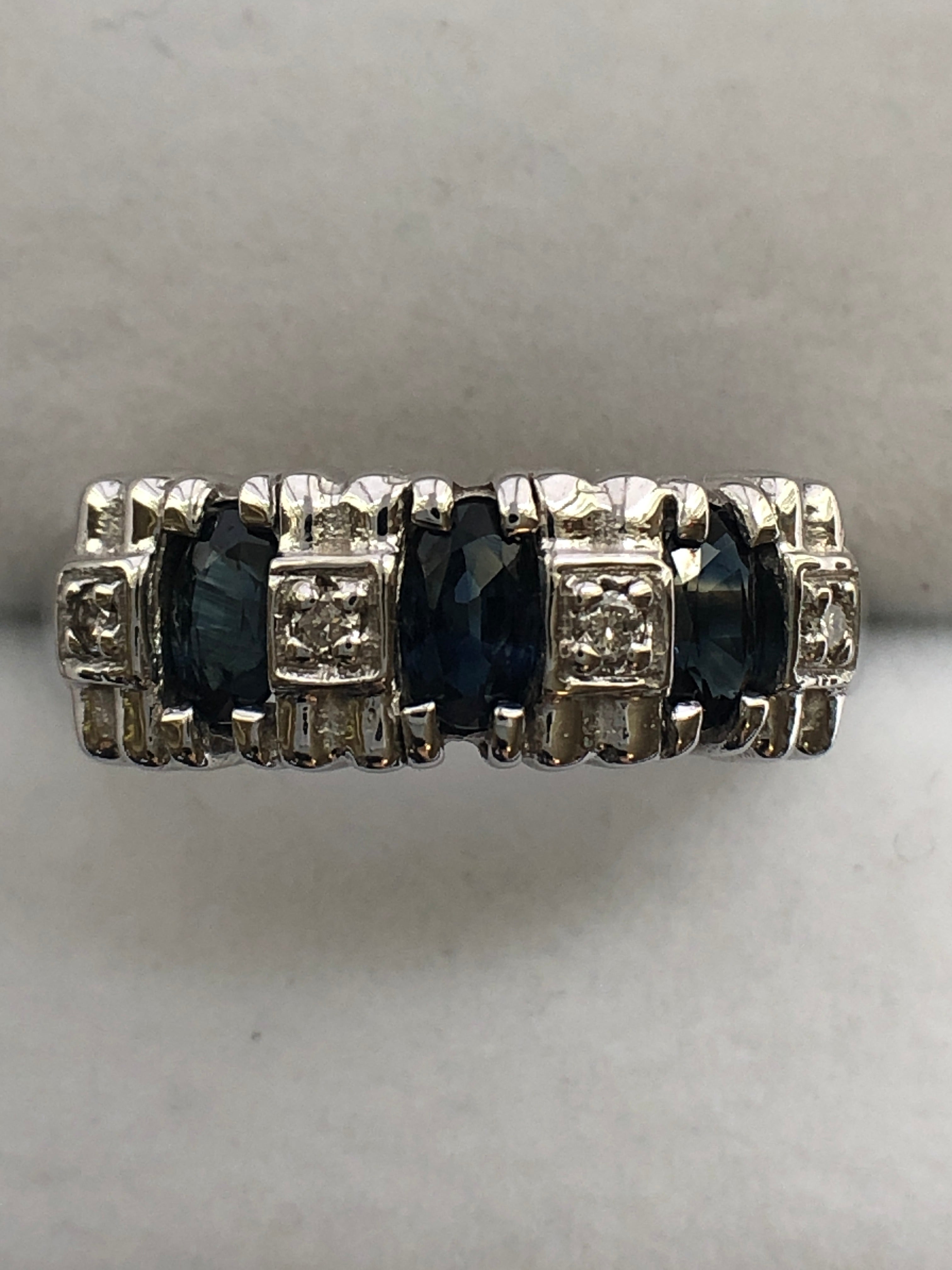A 14ct white gold sapphire and diamond ring