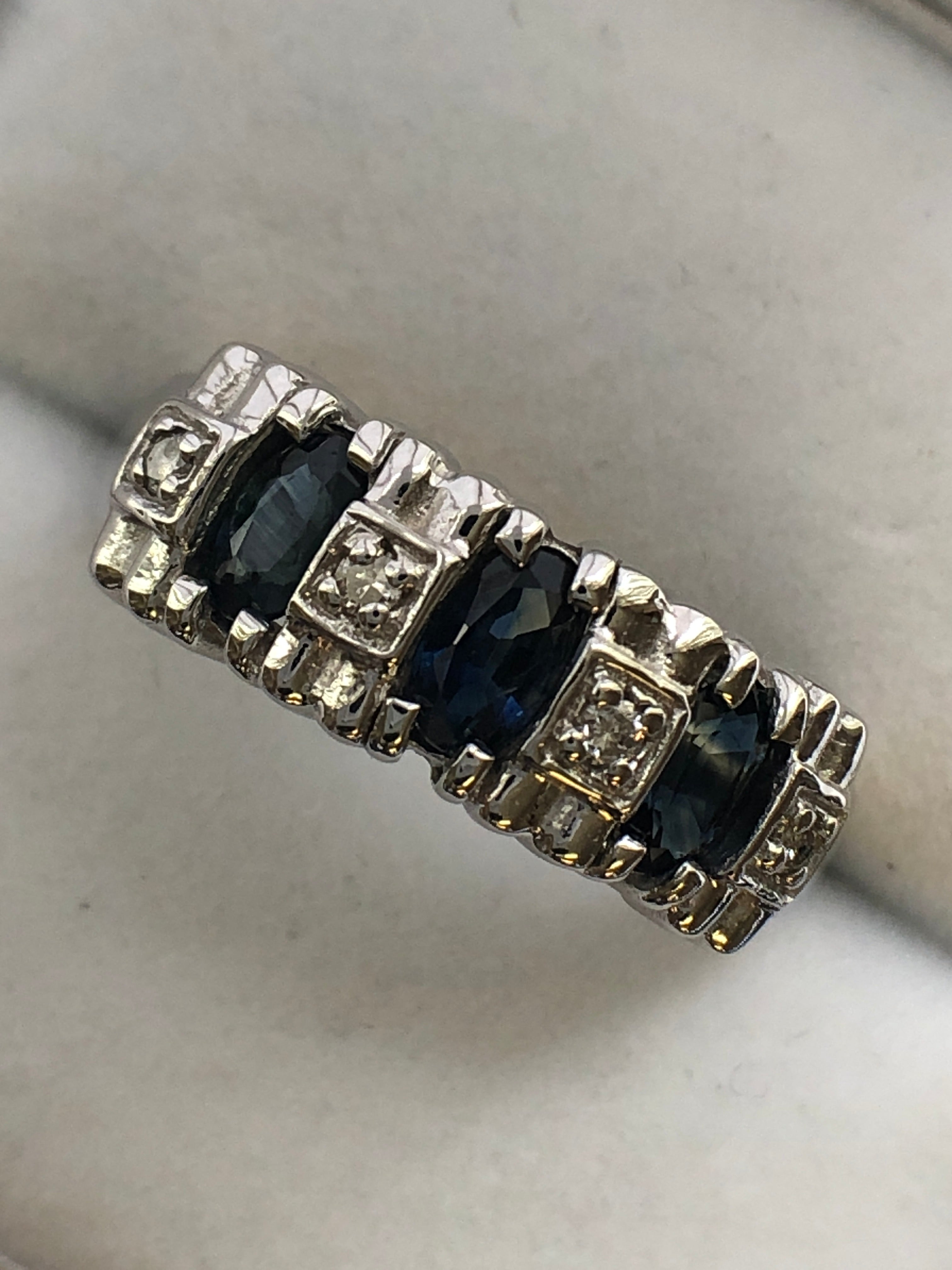 A 14ct white gold sapphire and diamond ring