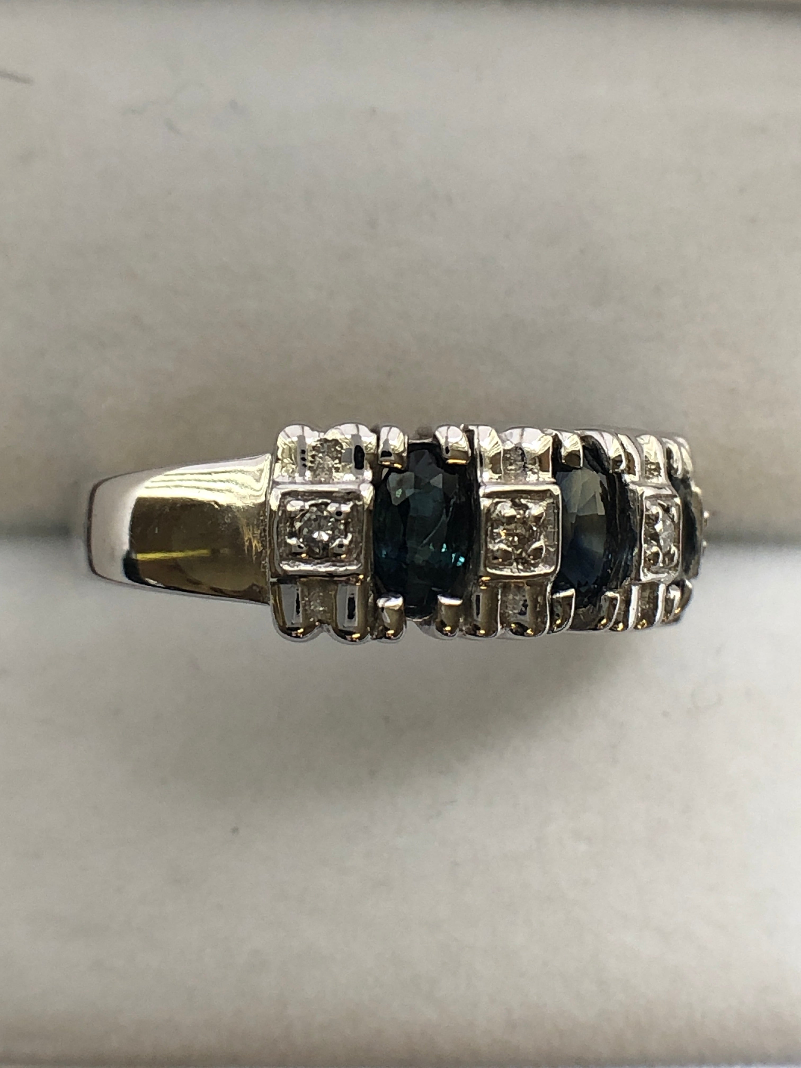 A 14ct white gold sapphire and diamond ring