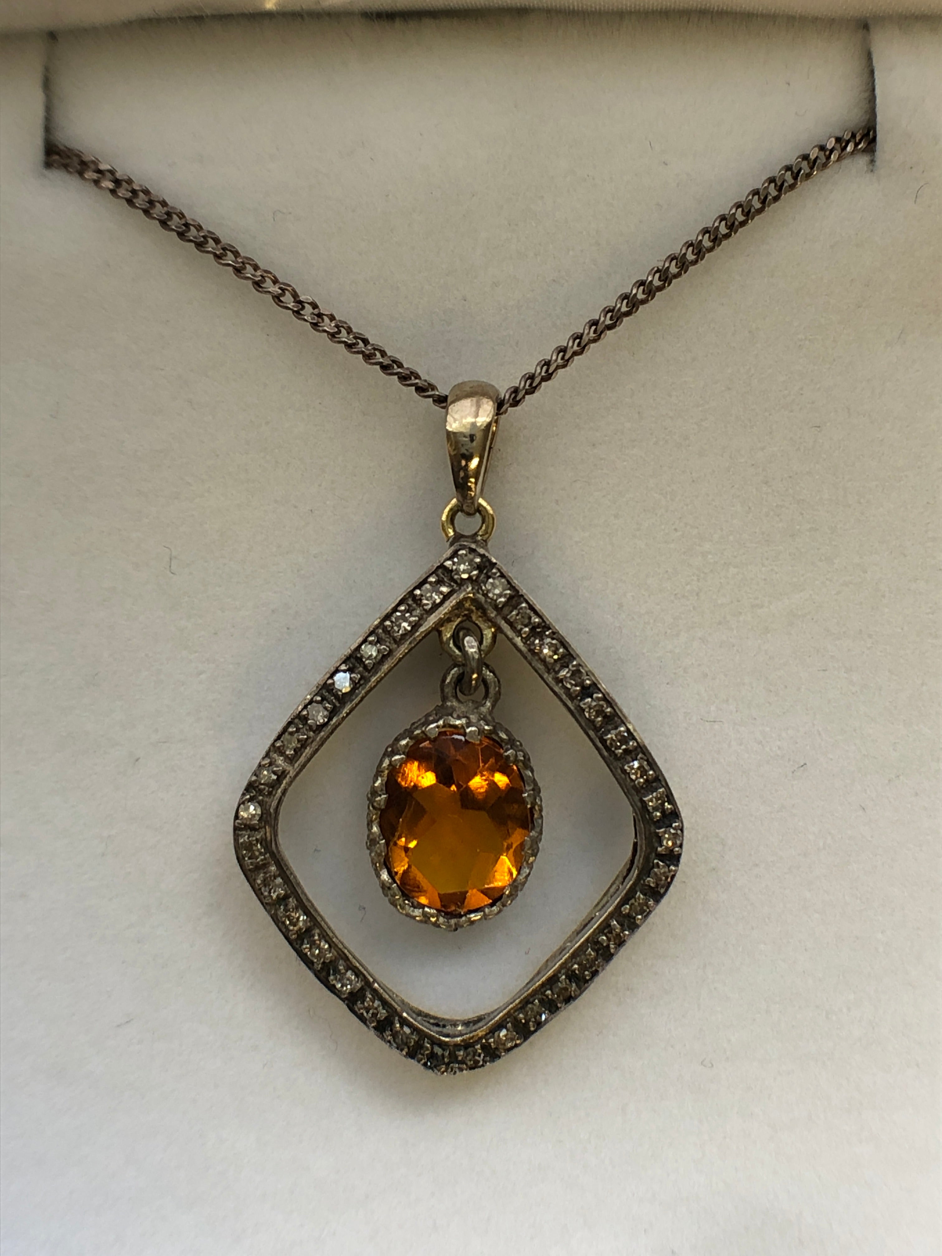 A Victorian silver citrine and diamond pendant
