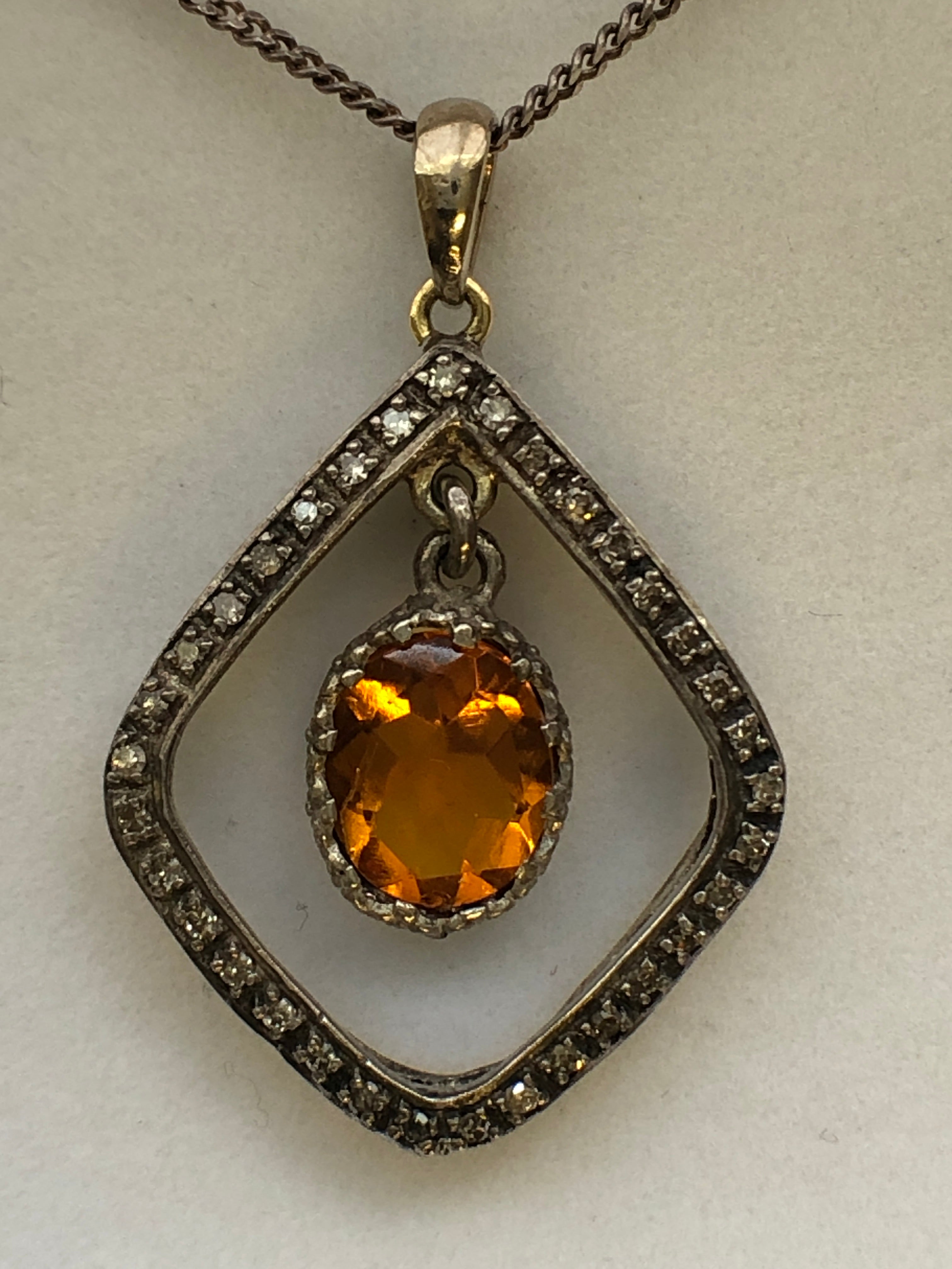 A Victorian silver citrine and diamond pendant