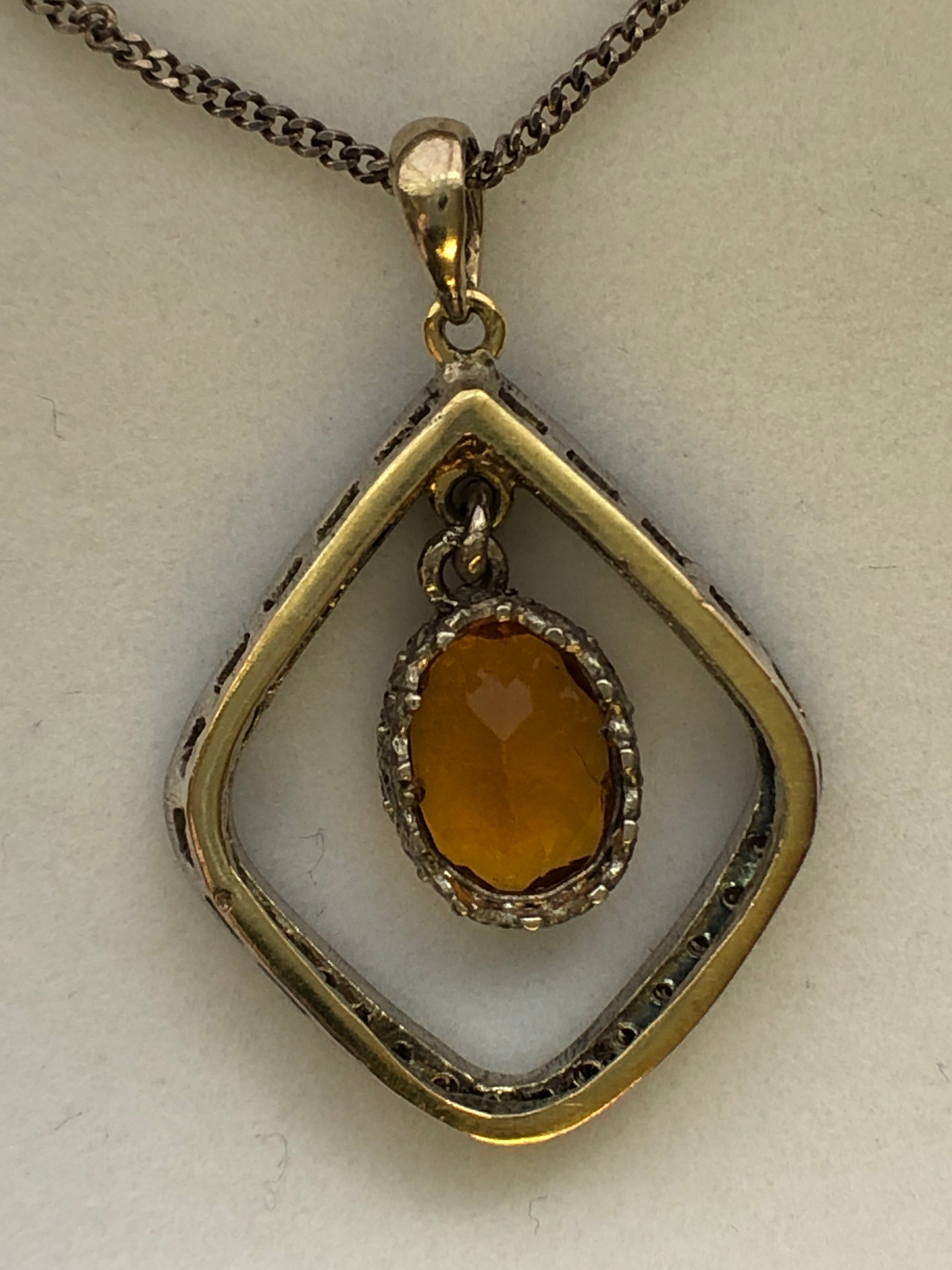 A Victorian silver citrine and diamond pendant
