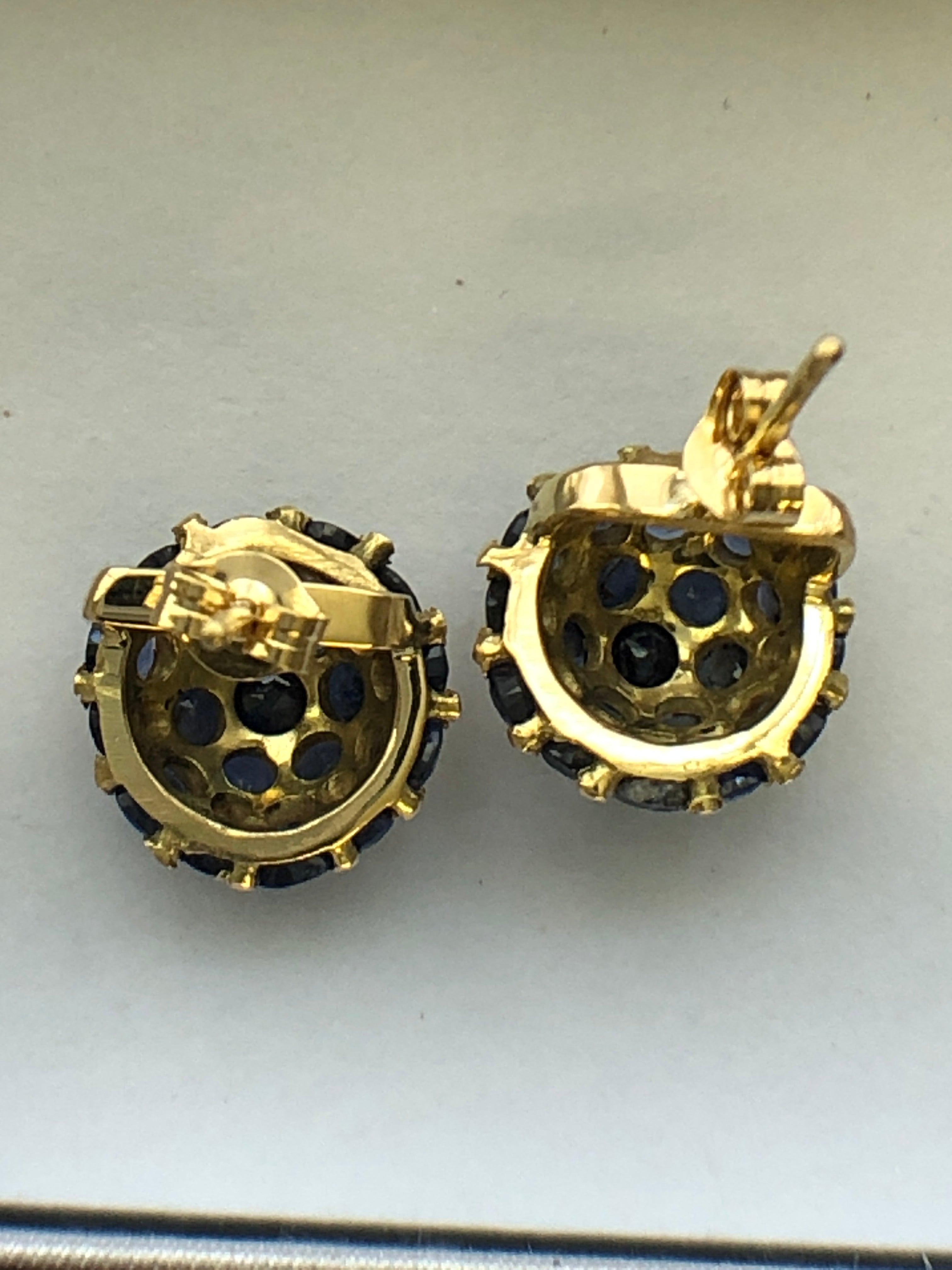 A vintage pair of sapphire cluster earrings