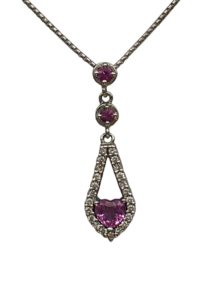 An 18ct white gold pink sapphire and diamond pendant