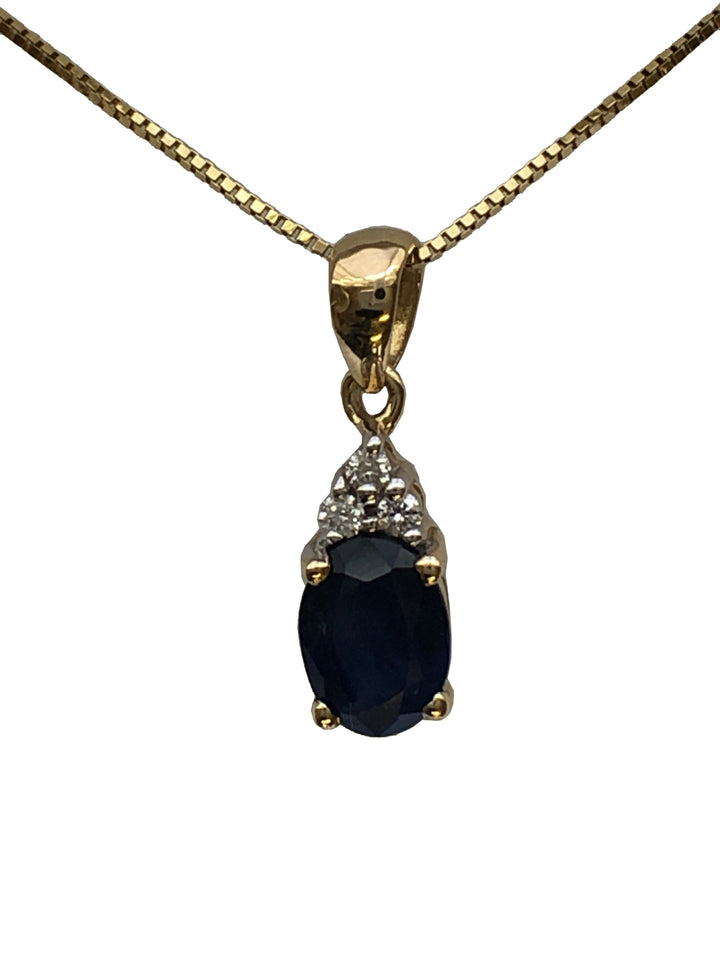 A 9ct gold sapphire and diamond pendant
