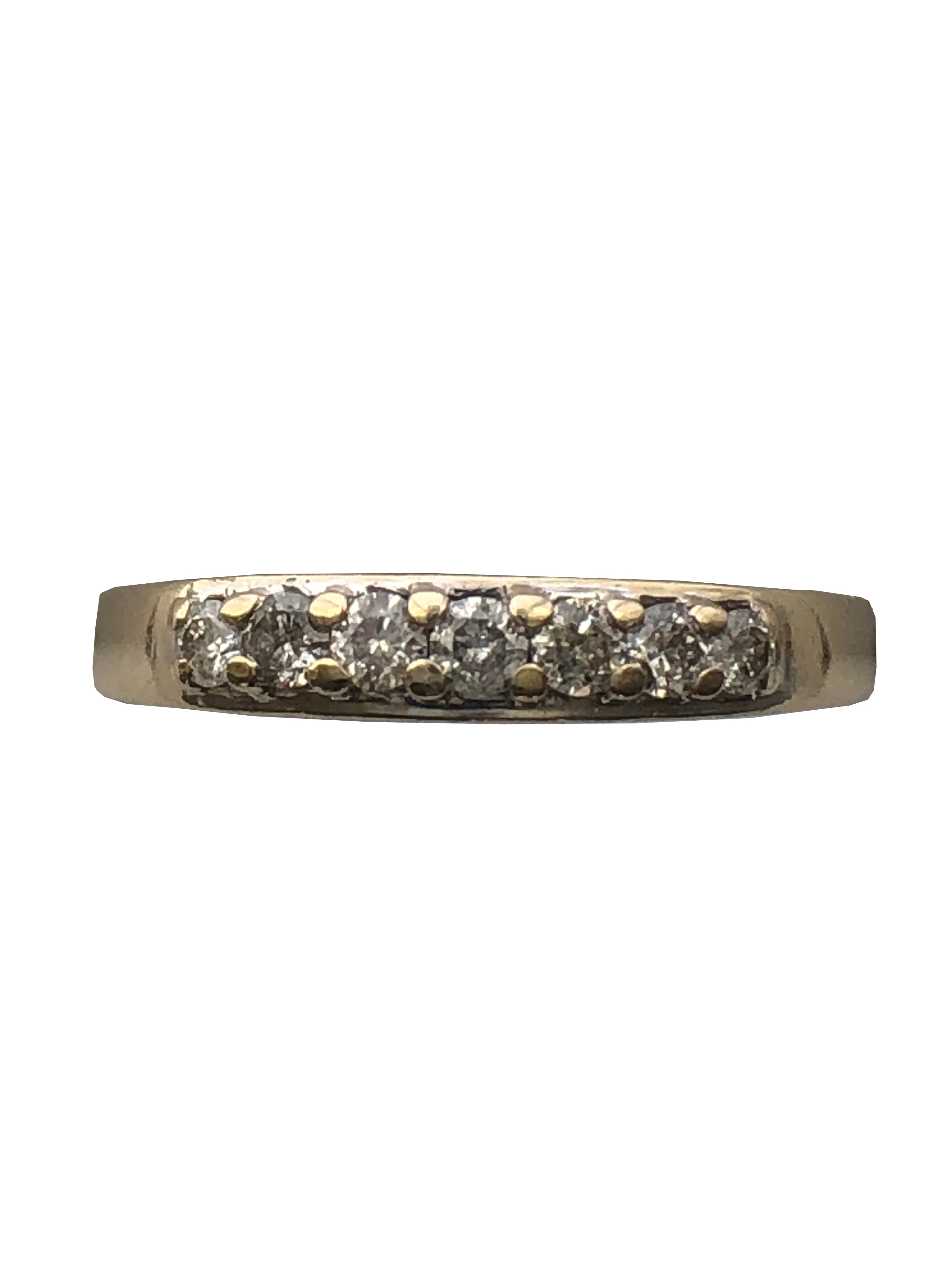 An 18ct gold diamond seven stone ring