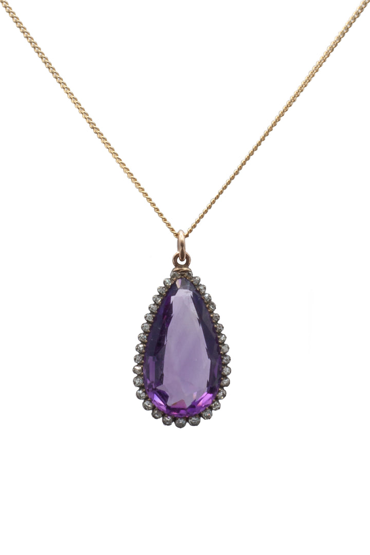 A 9ct yellow gold and silver amethyst and diamond pendant.