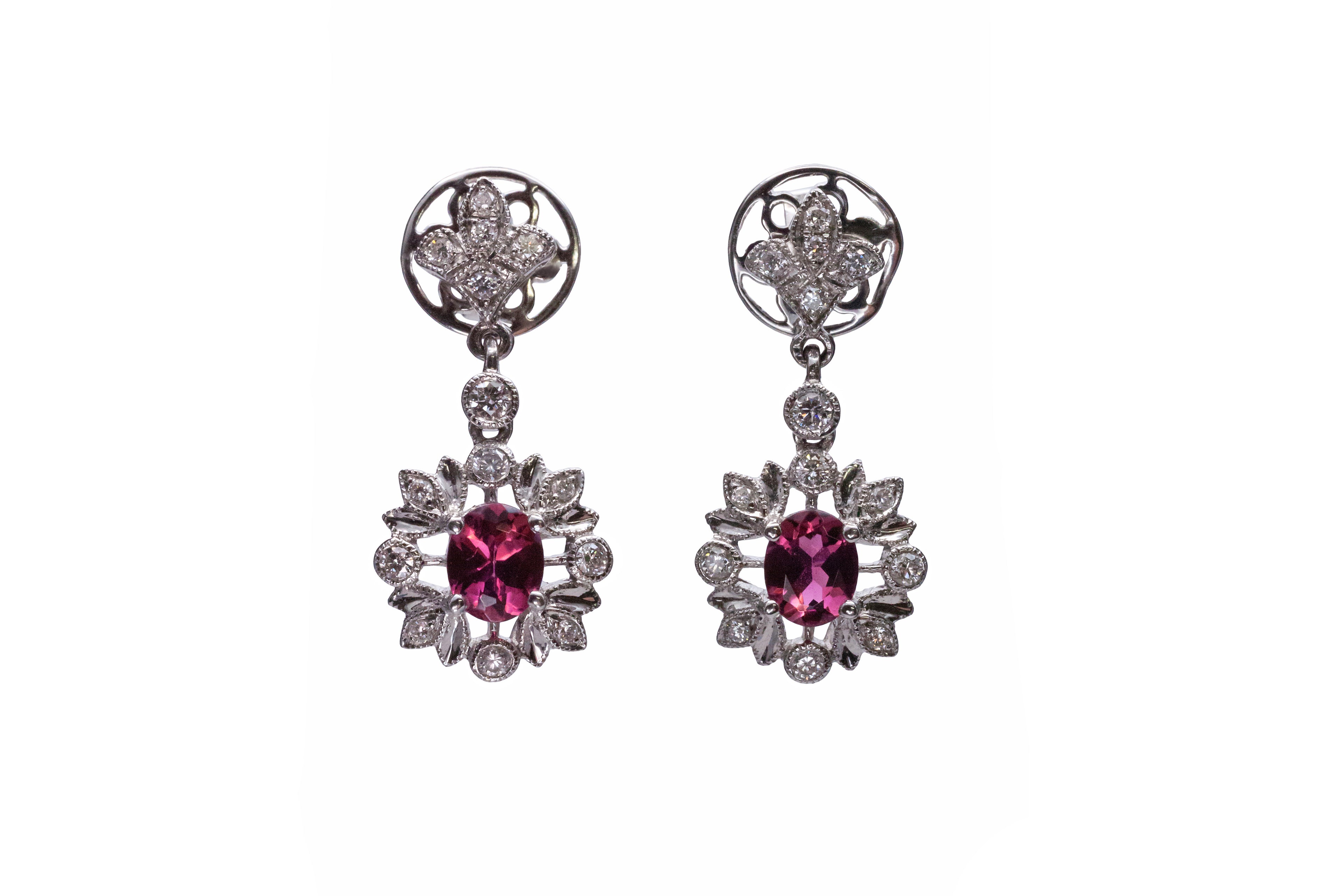 A pair of 18ct white gold tourmaline and diamond earrings.