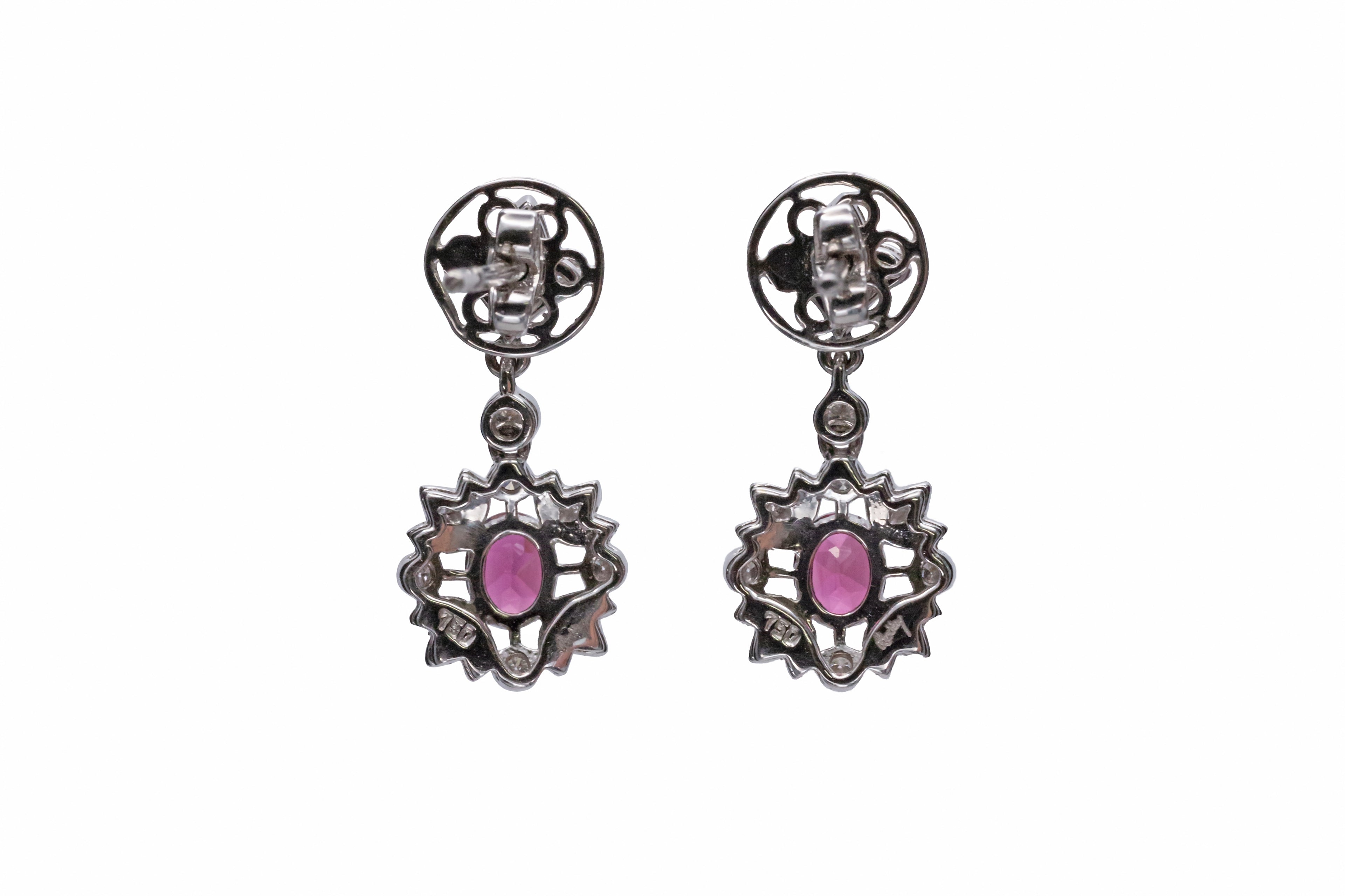 A pair of 18ct white gold tourmaline and diamond earrings.