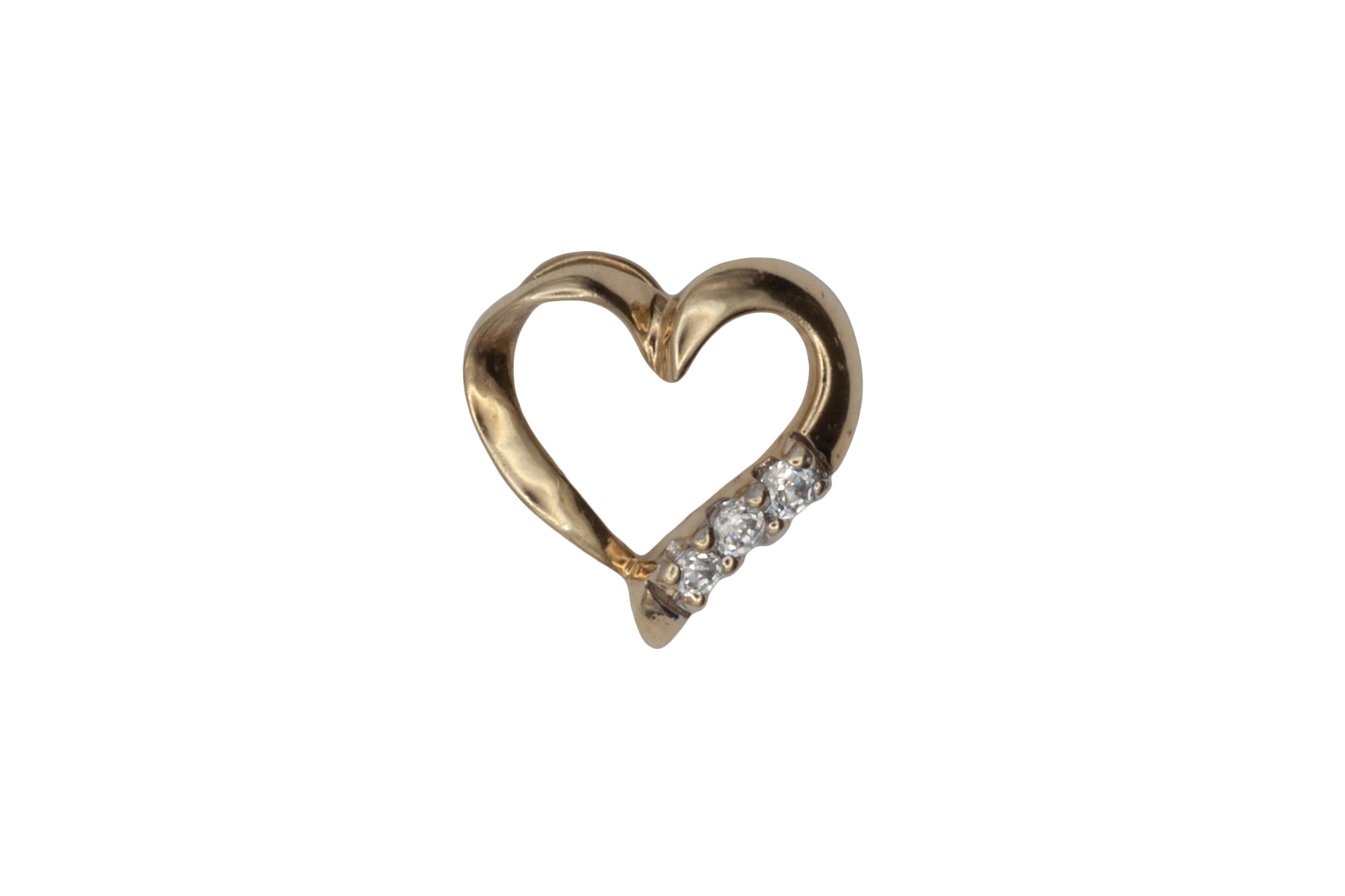 A 9ct gold cubic zirconia heart pendant on a 9ct gold chain