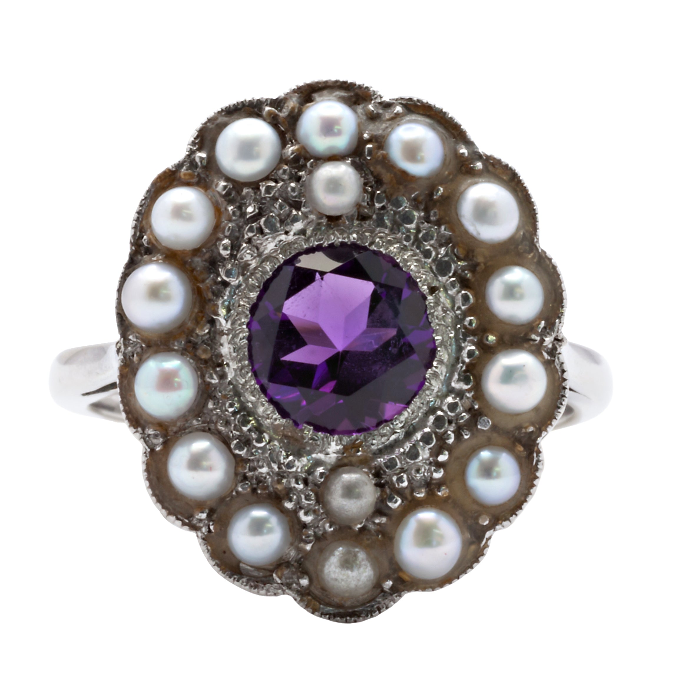 An 18ct white gold amethyst and seed pearl ring
