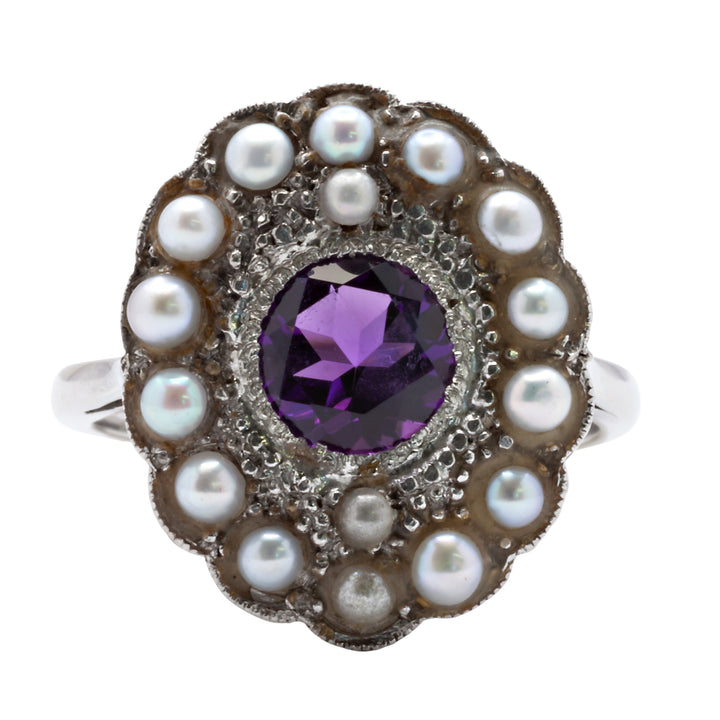 An 18ct white gold amethyst and seed pearl ring