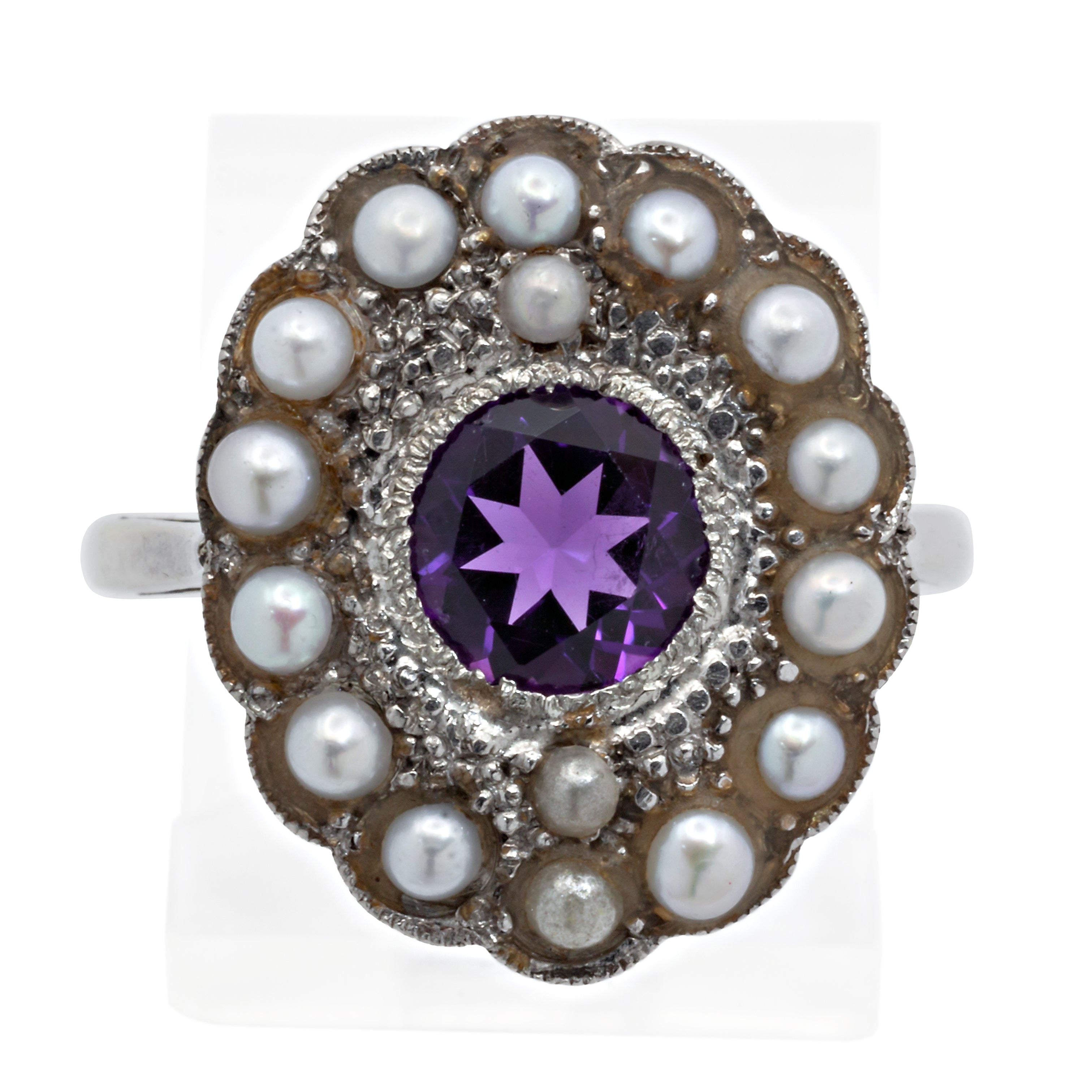 An 18ct white gold amethyst and seed pearl ring