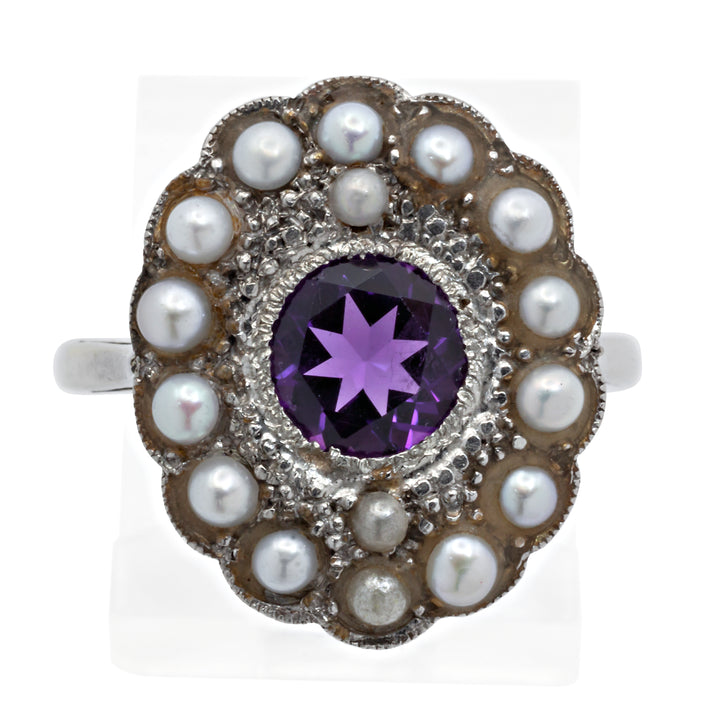 An 18ct white gold amethyst and seed pearl ring