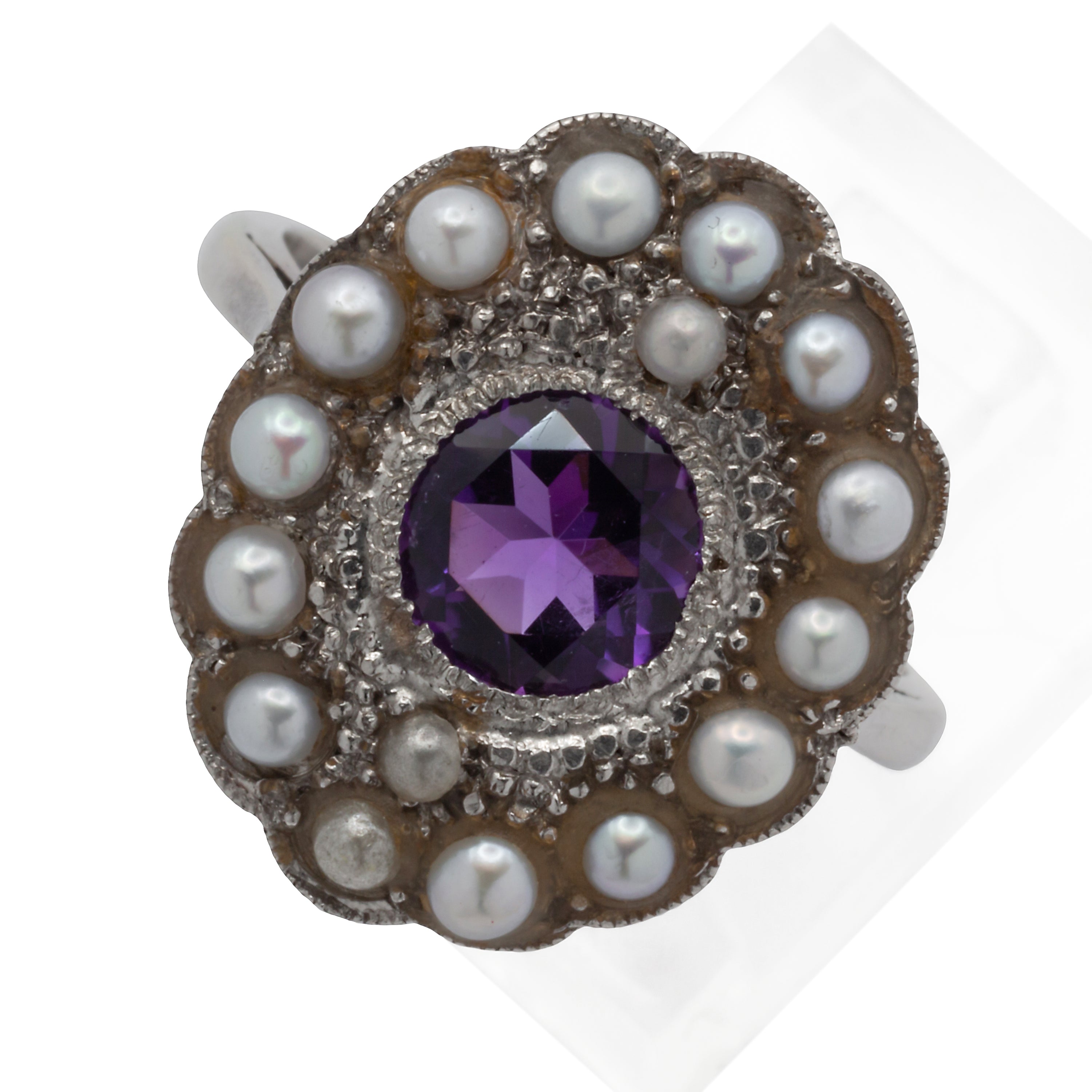 An 18ct white gold amethyst and seed pearl ring