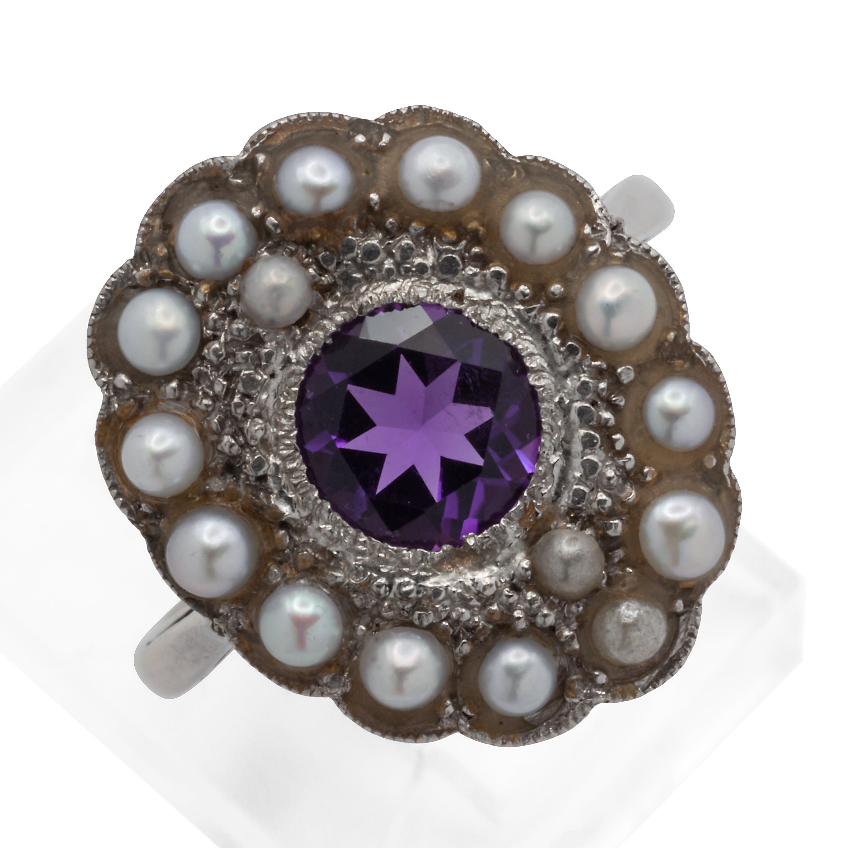An 18ct white gold amethyst and seed pearl ring