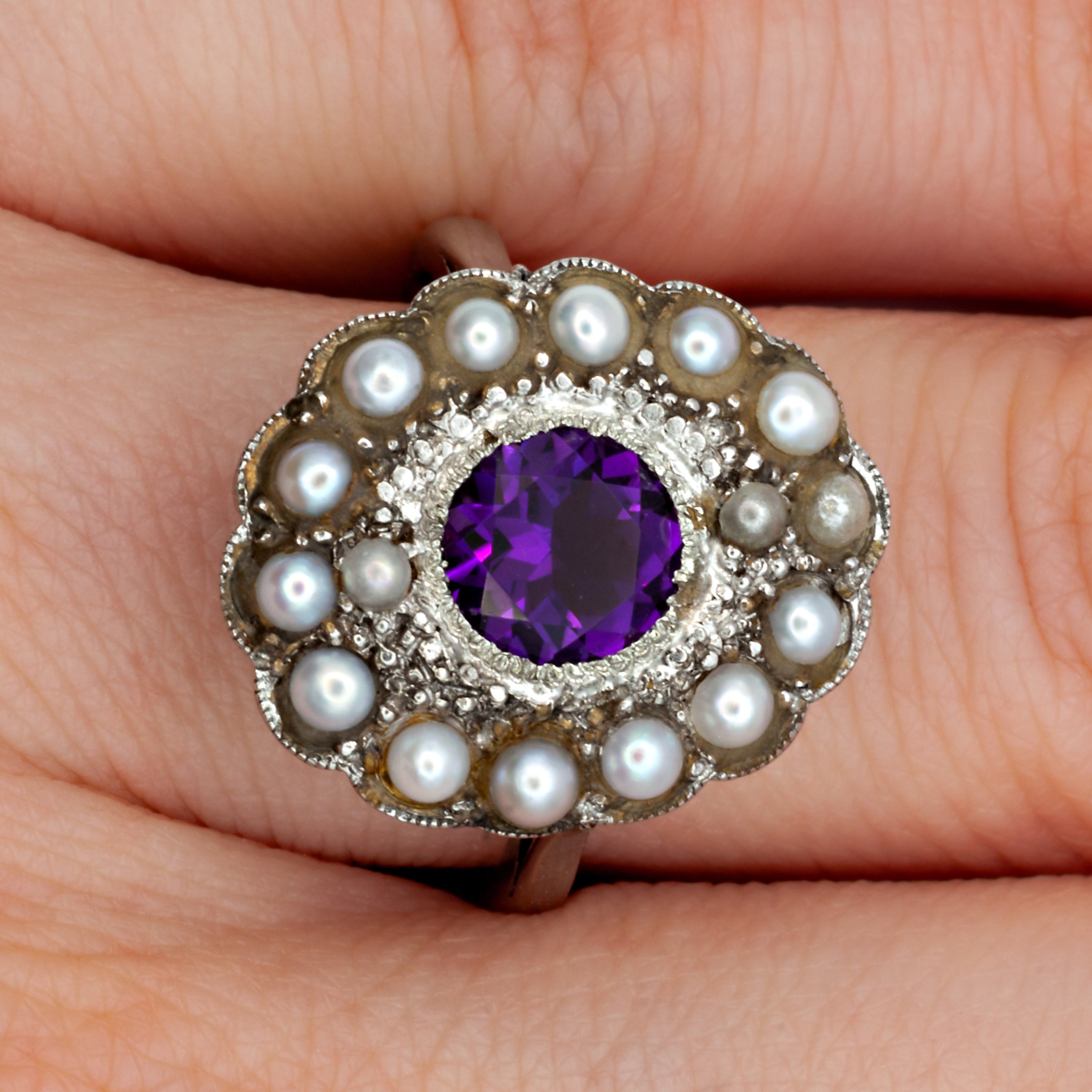 An 18ct white gold amethyst and seed pearl ring