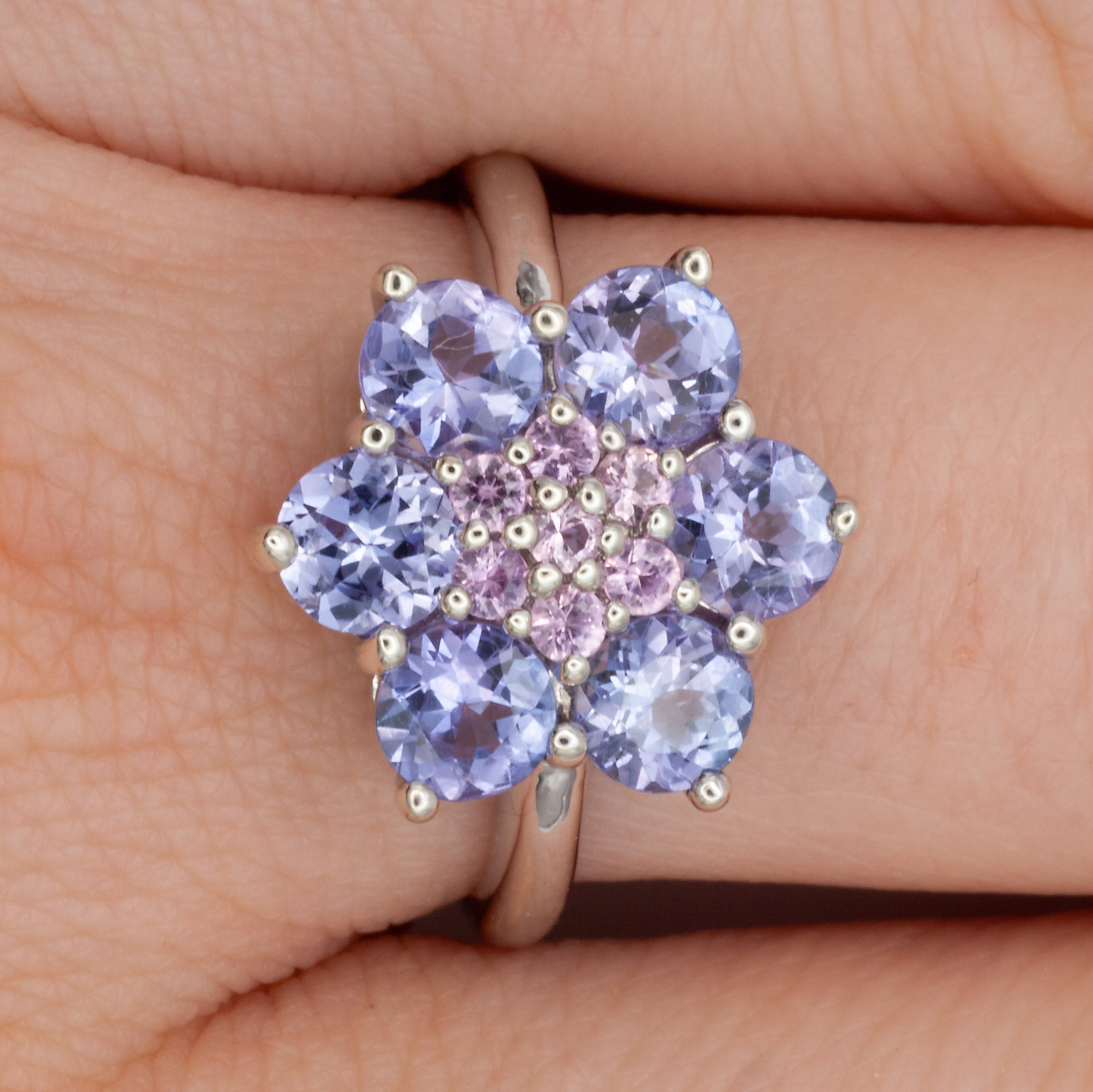 A 9ct white gold tanzanite and pink diamond ring