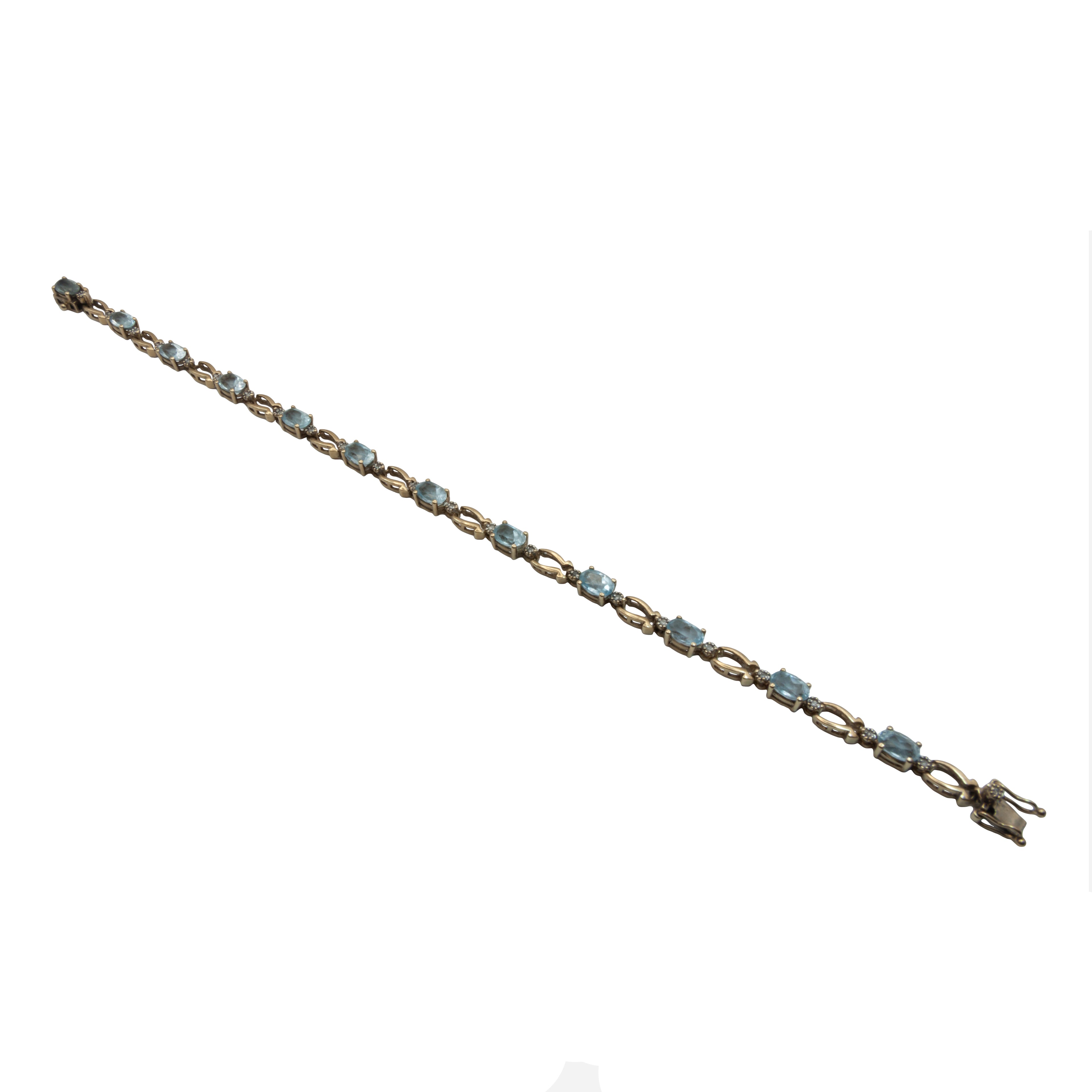 A 9ct gold blue topaz and diamond bracelet